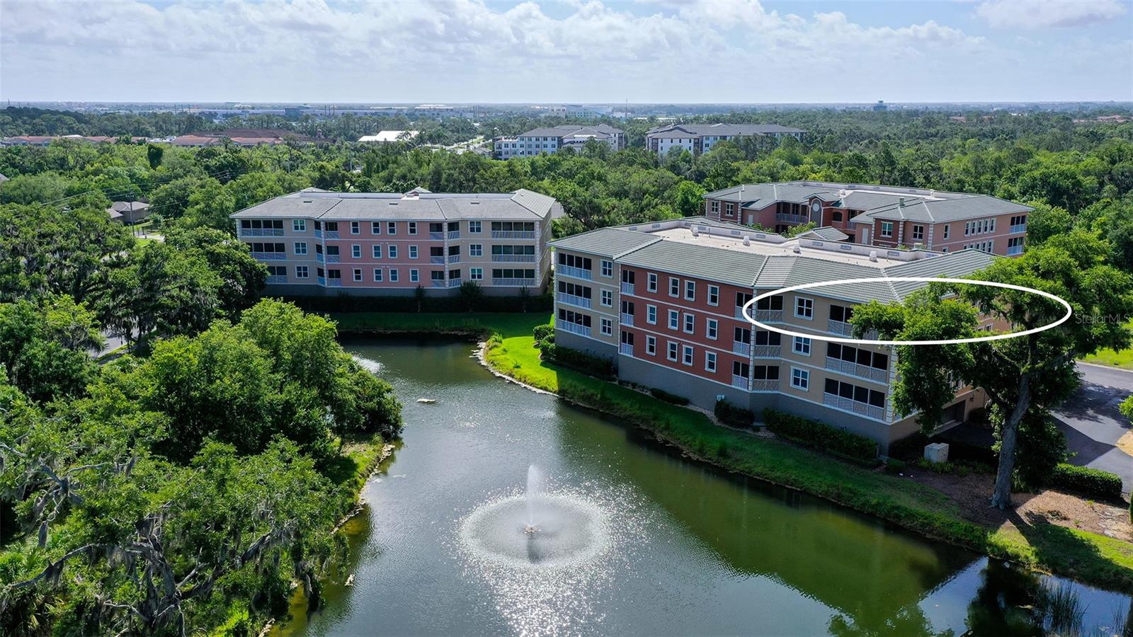 Nestled the Gated Sarasota Community of Grande Oaks Preserve this Beautiful TOP FLOOR Corner Unit this beautifully appointed condo home awaits its new owners! Upon entering the foyer of the home, you can experience all the natural light- provided by the wall of windows a corner unit offers. 2687 square feet of air-conditioned living space, this three-bedroom three bath split plan model. Tall ceiling with 8 Ft, solid doors throughout.  Crown Molding and Tray Ceilings, Solid Cherry Wood Kitchen Cabinets with custom lighting and timeless bamboo flooring are examples of the attention to the details the owners paid when selecting their finished options. The open floorplan provides an ideal flow for entertaining family and friends with the oversized enclosed porch adjacent to the living room no need to walk to the kitchen for more refreshments, the living room has a wet bar with wine cooler and undercounter refrigerator. The unit is equipped with a sprinkler system and surround sound throughout. AC is less than one year old! This is the owners Florida Winter Home and is being sold turnkey furnished. If you so choose, bring only your personal effects.
 
Within the general gated community, you are welcome to enjoy Tennis and or Pickleball on the community's Clay Courts or experience the Community Center equipped with an Exercise Room, Swimming Pool and there are plenty of opportunity to develop wonderful friendships with your new neighbors. Grande Oaks Preserve has an onsite property manager. Located a short drive to University Town Center and the commercial surrounding areas designed for shopping, entertainment, and recreational pastimes of your choosing. So much fun close by. Year-round entertainment indoors and outside for local residents and for visitors alike. Oh, and do experience the NEW World Class Mote Marine Seaquarium. Fully Funded Reserve in Place. NO CCD Fees. Two assigned parking spaces for each condo on ground floor. additional storage locker located on groung floor near parking spaces.