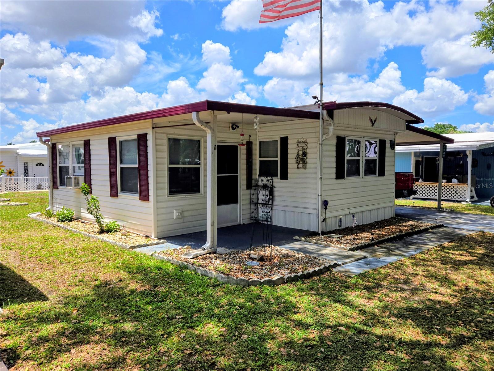 Nice price Reduction!! Motivated Seller!! Welcome Home to Country Aire Village. A 55+ Co-op, You own the property. Resident owned Community for Active Adult Florida Living. Super Affordable Low HOA ($140) includes Internet, Cable TV, Heated Pool, Pickle Ball, Recreational Hall, Sunday Concerts, Free R.V. or Boat Parking in the 5 Acre Lot. A Full Activities Calendar and more. This beautiful home is the perfect place to get away in the winter or make it your year round residence. Enjoy the privacy in the back of the community by the 5 acre lot. Welcome to 6235 Parksend Lane. This singlewide home is full of upgrades and beautifications which include the electrical system, Air Conditioner 2024, a fully finished 10 x 20 Bonus Room with television, electric fireplace, newer tile walk in shower with ceramic tile, newer ceramic tile flooring in the kitchen, hallway and bathroom. Lots of exterior storage space for a workshop and garden tools. This home is being sold furnished with a queen bed, twin bed, a rocker and chair, sleep sofa, televisions, dressers and more.