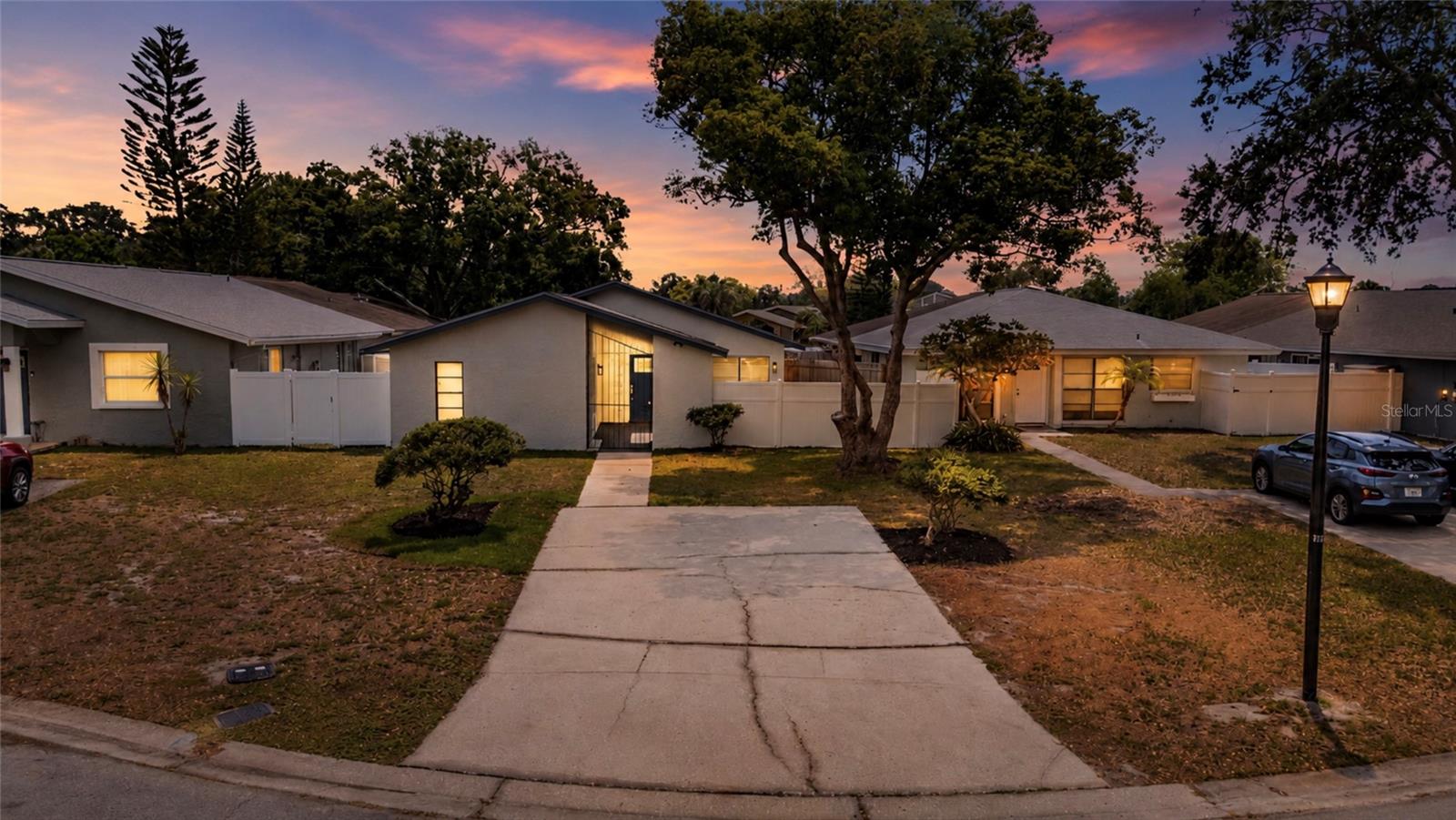 One or more photo(s) has been virtually staged. BEAUTIFULLY REMODELED & MOVE-IN READY! Stunning 3 bedroom, 2 bath, block home located in the highly sought-after Plantation subdivision in the heart of Carrollwood! No detail was spared in this fully remodeled home that perfectly combines modern upgrades with comfort and functionality.

A cool, covered front courtyard welcomes you into this charming split floor plan home and creates the perfect private outdoor space for relaxing or entertaining year-round. Inside, you’ll find a spacious living room and dining room filled with natural light, along with a completely redesigned designer kitchen featuring custom wood cabinetry, gorgeous quartz countertops, stainless steel appliances, custom subway tile backsplash, and sliders leading to the side patio.

Both bathrooms have been beautifully remodeled with custom vanities, updated sinks, faucets, toilets, designer tile work, and sparkling stone countertops. The primary suite showcases a stunning custom walk-in shower and upgraded closet shelving/organizers. Throughout the home you’ll find durable laminate plank flooring and upgraded tile flooring, NO CARPET anywhere!

This home has been meticulously updated from top to bottom with the “big ticket items” already completed for the new owner, including: NEW ROOF 2025 | NEW AC SYSTEM 2026 | NEW WATER HEATER 2026 | NEW STAINLESS STEEL APPLIANCES 2026 | NEW LAMINATE FLOORING & TILE 2026 | New Interior & Exterior Paint 2026 | New Ceiling Fans & Light Fixtures Throughout | New Front Door | New Bedroom, Bathroom & Closet Doors | Popcorn Ceilings Removed with New Knockdown Texture on Walls & Ceilings | New Insulation in Attic & Resealed Ductwork | New Window Treatments | Updated Laundry Closet Cabinetry & Hamper Cabinet | Landscaping & New Courtyard Grass.

Additional features include a large open-air back patio, private fenced courtyard, spacious storage shed, and convenient storage room perfect for bikes, tools, pool toys, and more.

Plantation residents enjoy incredible community amenities including community pools, playgrounds, tennis courts, basketball courts, racquetball courts, soccer fields, walking and biking trails, parks, and lakes for fishing and wildlife viewing. Conveniently located just minutes from the Veterans Expressway, Citrus Park Mall, Tampa International Airport, restaurants, shopping, and entertainment. NO CDD, LOW HOA and NO FLOOD insurance required! 

Fully remodeled homes like this rarely become available in Plantation, don’t miss this incredible opportunity!