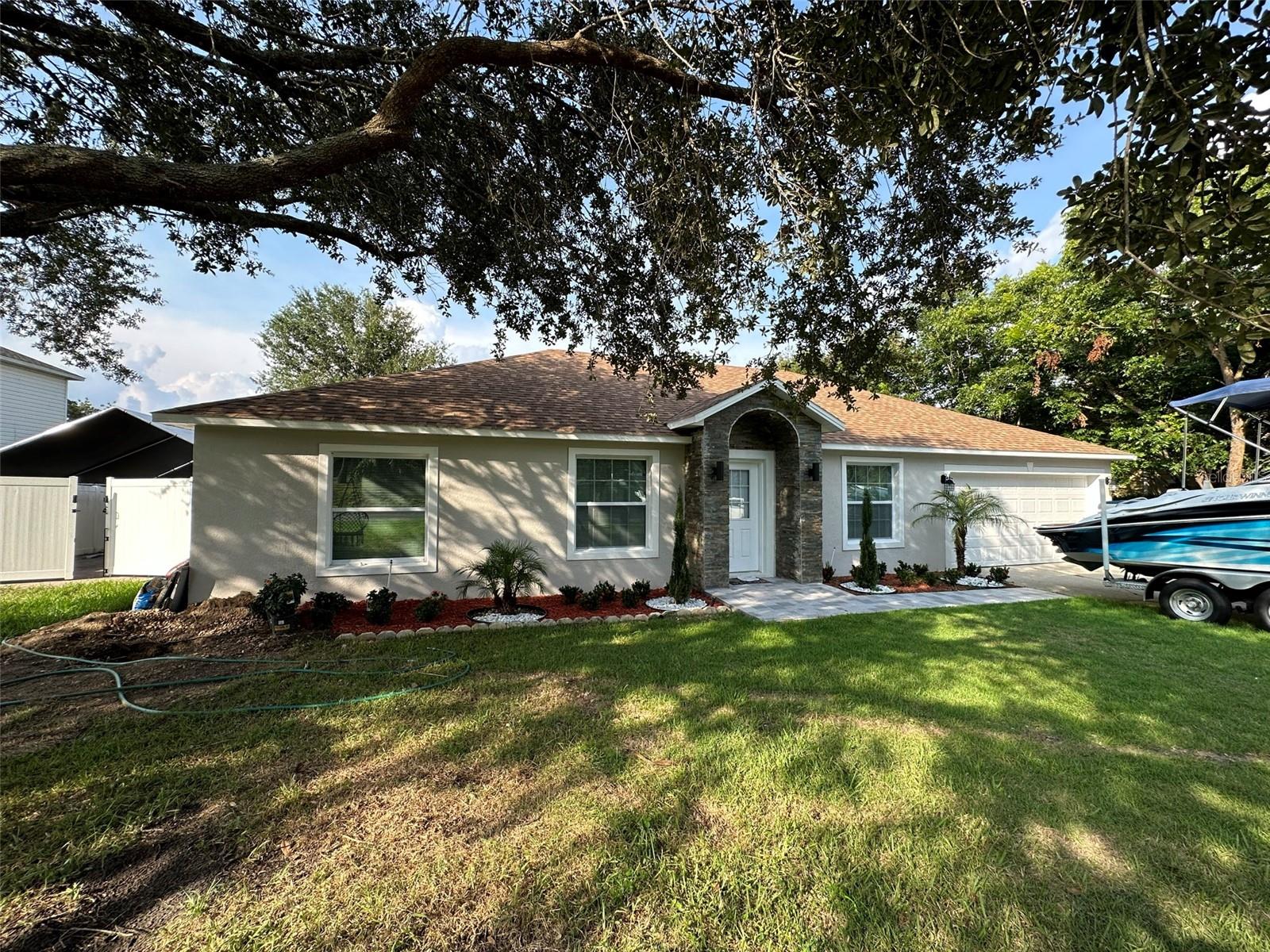 This well-maintained 3-bedroom, 2-bathroom home offers more than 2,000 square feet of comfortable living space on an oversized lot of more than one-third of an acre. The open floor plan features a spacious great room, a large family room, and a well-appointed kitchen with an oversized island and casual dining area. Vaulted ceilings create an open and inviting atmosphere throughout the home.

A cozy flex space connects the kitchen and family room, while sliding glass doors lead to a screened lanai overlooking the private backyard. The property is RV- and boat-storage friendly and also features solar panels and EV charging, making it an excellent option for tenants seeking convenience, space, and energy efficiency.

A fixed monthly energy fee of $250 applies.

The Clermont bike and walking trail begins at the neighborhood entrance, with nearby parks, playgrounds, a dog park, splash pad, boat ramps, and beaches. Shopping, dining, and everyday conveniences are just minutes away. Roof replaced in 2019, HVAC replaced in 2023, and water heater replaced in 2023. Available for rent—schedule your private showing today.