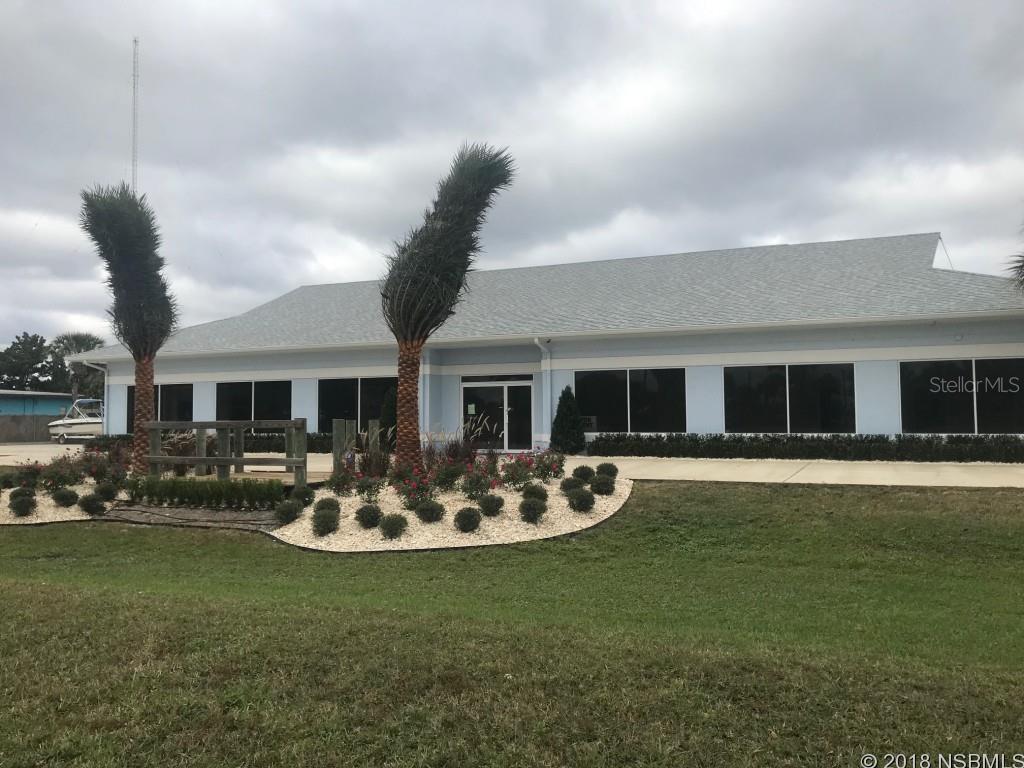 Leasing opportunity at a one of a kind Commercial Waterfront Location offers unparalleled versatility and beauty!  Anchored by Freedom Boat Club, this space is Zoned Commercial Marina and within the city limits making the possibilities for your business extensive including bar/restaurant, boat sales/fueling, retail sales of boating, fishing, skiing and much, much more.  Directly across the street from New Smyrnaâs most popular public boat launch, the exclusive New Smyrna Beach Marina, and just down the street from all the entertainment of busy Flagler Avenue and our renowned drive on beach.  Such current projects as the Riverwalk Condominiums, New Smyrna Marina Townhomes, and exciting future projects as the North Causeway Marina Village are making is district the next hot spot for your investment opportunity.  The existing structure features approx 2500 sq ft with over 240 ft of road frontage, 12 ft ceilings and a 100 ft glass storefront which is visible from busy North Causeway. $500.00 monthly CAM actually helps make this more affordable and includes the utilities & 6.3% tax. Donât miss out on this amazing property with excellent opportunity to grow or begin your business. ;Water: City
