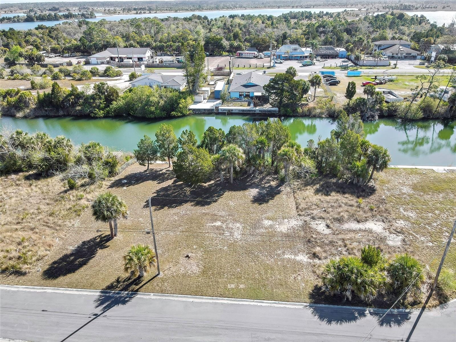 Double the Space, Double the Paradise! Own the ultimate coastal footprint with this double-lot package at 3196 & 3202 Rose Arbor Drive. Boasting a massive 100ft of frontage, this level .22-acre site is the premier canvas for your custom Gulf-access estate. Ditch the boat trailer and embrace the lifestyle: use the private neighborhood boat lift for world-class fishing, scalloping, and Gulf exploration. When you aren't on the water, you're steps from the pristine Weeki Wachee Preserve and minutes from the vibrant local seafood and marina scene. Enjoy the serenity of a peaceful, golf-cart-friendly community with NO HOA fees and public utilities ready for your build.  Don't just settle for a standard lot.  Secure your oversized slice of the Adventure coast today.