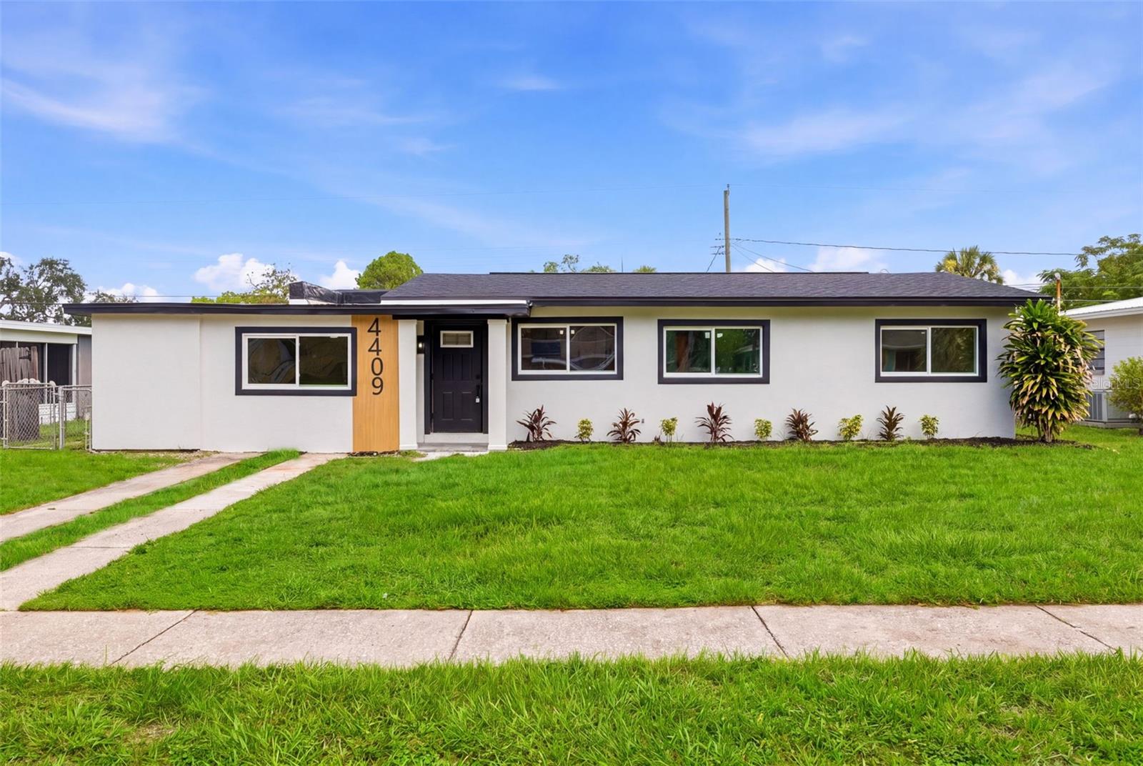 Welcome to this beautifully renovated 4-bedroom, 2-bath South Tampa home, where modern style meets peace of mind.The home did not flood during the recent storms, offering added confidence in this desirable South Tampa location.  Thoughtfully redesigned with an open-concept floor plan, this move-in-ready home has been updated from top to bottom with quality craftsmanship and fully permitted improvements.

The stunning new kitchen features quartz countertops, brand-new cabinetry, and new stainless steel appliances, seamlessly flowing into the spacious living and dining areas—perfect for everyday living and entertaining. Both bathrooms have been completely remodeled with contemporary finishes.

Enjoy the confidence of extensive major upgrades, including new hurricane-rated windows, a new roof and flat roof, new screened-in lanai, newer A/C, new air ducts, new insulation, new water heater, new electrical panel with complete whole-house rewire, new plumbing, and fresh modern stucco.

Conveniently situated just minutes from the waterfront, Downtown Tampa, St. Petersburg, shopping, dining, entertainment, and major roadways, this home combines exceptional updates with an unbeatable location. Simply move in and enjoy worry-free living!