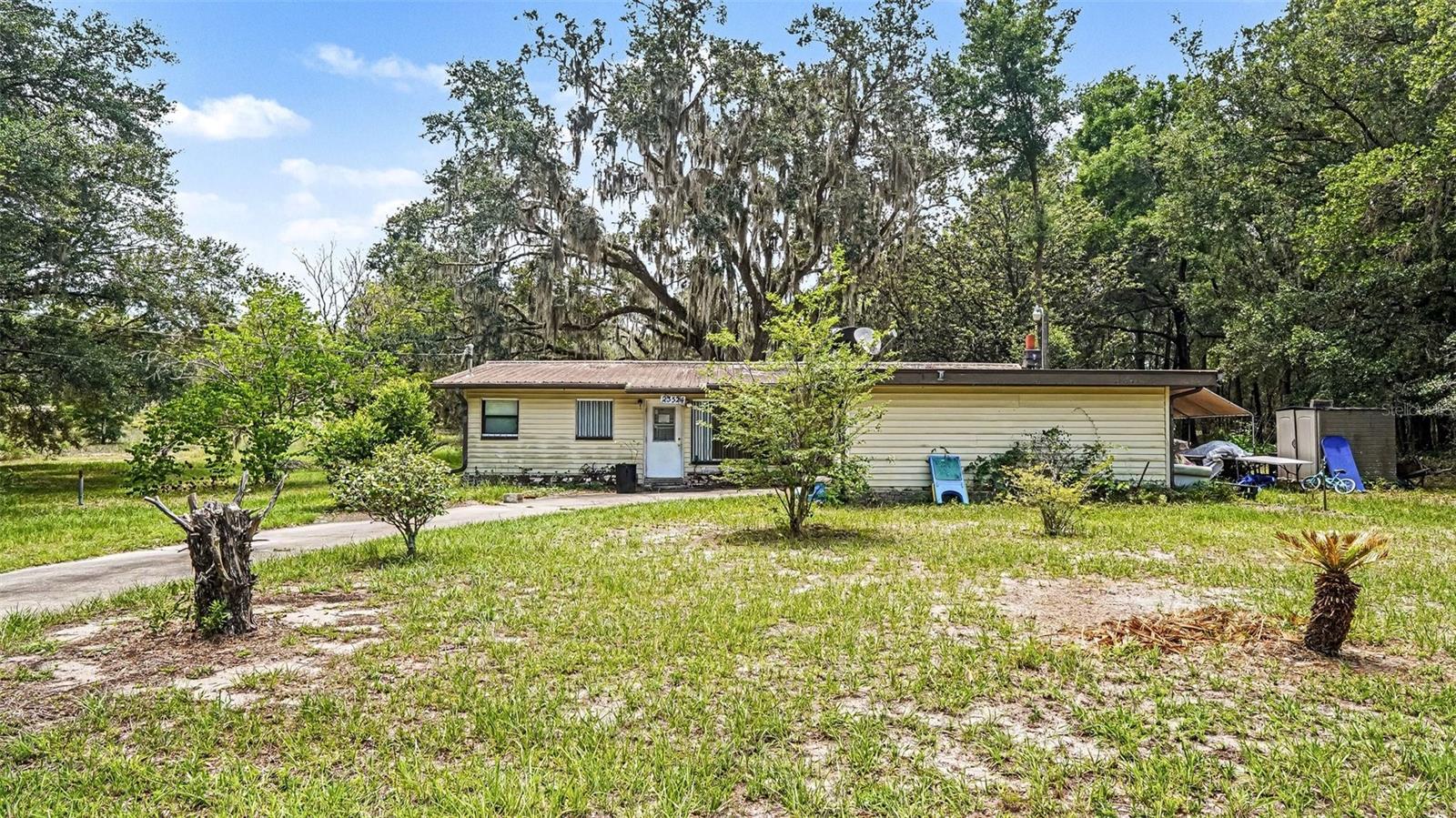 Opportunity awaits at 23524 SW Tamarix Ct, Dunnellon, FL 34431. Situated on a spacious 0.99-acre lot, this 2-bedroom, 1-bath home offers over 2,000 square feet of potential for investors, flippers, or buyers looking to create their dream home. With solid square footage and a generous lot size, the possibilities are endless. Whether you're looking to renovate and resell, add to your rental portfolio, or customize a property to your own vision, this is a chance to unlock significant value. Enjoy the privacy and flexibility that come with nearly an acre of land while still being conveniently located near local amenities, outdoor recreation, and everything Dunnellon has to offer. Bring your vision and transform this property into something special. Don't miss this value-add opportunity with room to grow!
