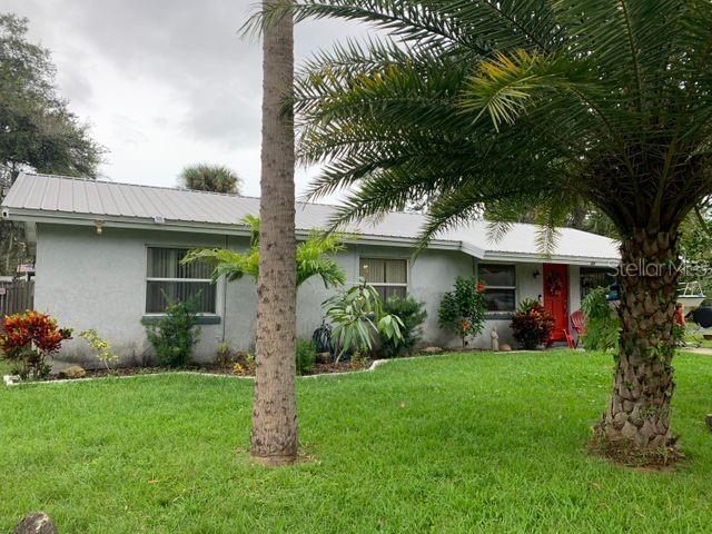 Great home nestled on a quiet street with great neighbors and with NO HOA in Edgewater. New Metal roof. This home has nice landscaping and mature fruit trees. Screened in pool with newly painted pool deck. House newly painted inside. Lovely starter home or just a great place to settle down and enjoy the pool. A unique feature of a separate screened in built in BBQ room to enjoy nights out grilling. two storage sheds and plenty of parking for your boat or other toys. ;Water: City