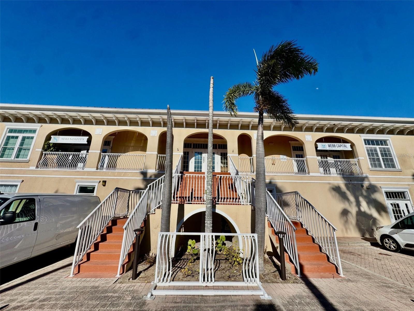 BAYVIEW PLAZA - A RARE OPPORTUNITY to lease office space in a highly sought-after, high-traffic location. Situated in a vibrant plaza alongside Two Scoops Ice Cream Shop and the USPS, and directly across from the Pier, this property offers outstanding exposure and convenience for both clients and staff.

The office features a welcoming reception area complete with a coffee station, creating a professional and inviting first impression. The functional layout comfortably accommodates 3–4 workstations, plus an additional private office, ideal for focused work or meetings.

Architectural highlights include vaulted ceilings that enhance the sense of space and natural light, along with a private balcony for fresh air or informal breaks. A private restroom adds to the convenience and autonomy of the space.

Perfect for professionals seeking visibility, charm, and practicality in a premier coastal setting, this office delivers location, flexibility, and character all in one.