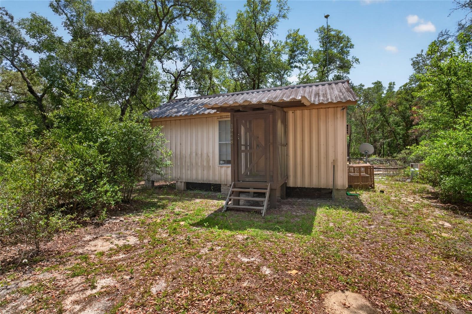 Looking for a getaway? Come enjoy natures's beauty while loving the privacy everyone craves! IF you like to hunt or just need to get some peace and quiet, this one is for you! This 1/1 with a loft cabin is nestled away in Forest Lake Park. It features a front and rear screened-in porch, small shed for storage, a metal roof, and a newer (2025) well pump. Scheduke a tour today, it won't last long!