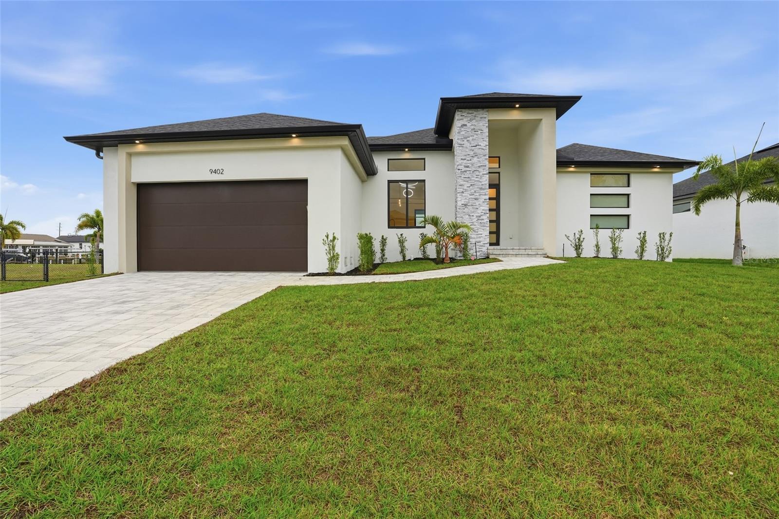 Discover modern living in this 4 bedroom, 3 bathroom Pool home boasting 1894 sq ft with beautiful canal views and gulf access. Sleek and stylish, this home features an open concept layout, porcelain tile throughout, high ceilings and impact doors & windows. Retreat to the spacious backyard that features a covered lanai and pool perfect for large gatherings and fun. Be the first to occupy this new construction home in the relaxed, waterfront community of South Gulf Cove. NO HOA,  Seller incentives available.  Lease to own available. Seller willing to provide small 2nd mortgage subject to approval and availability.