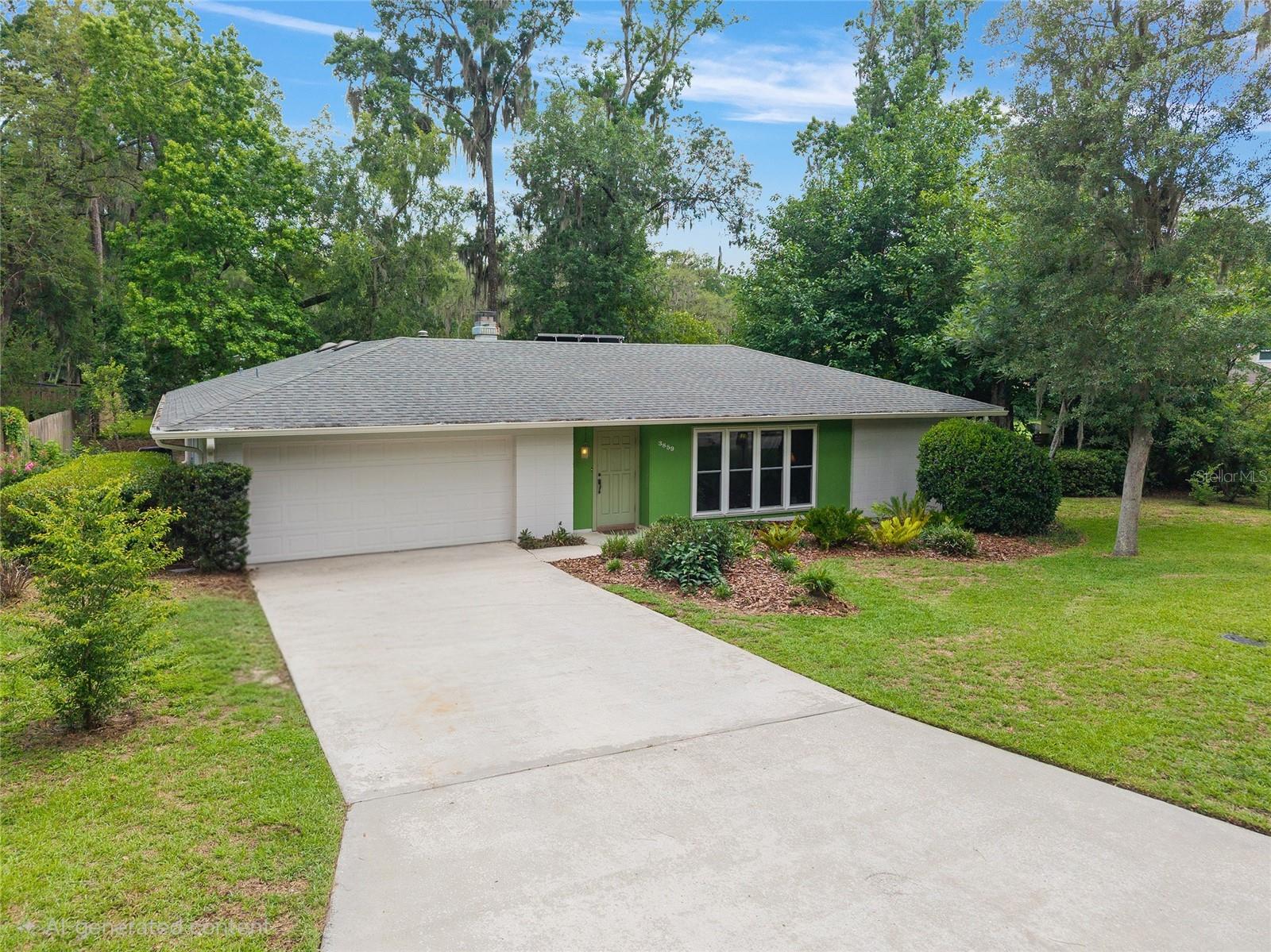 Beautifully maintained 4-bedroom, 2-bath ranch-style block home situated on a lushly landscaped lot in a prime NW Gainesville location. This spacious home offers a functional floor plan with a welcoming living room that flows into the dining area, plus a separate family room featuring a cozy gas fireplace—perfect for everyday living and entertaining.The home showcases timeless 3/8" hardwood flooring throughout the main living areas and bedrooms, with tile flooring in the bathrooms. The generously sized kitchen offers a gas cooktop, a casual eat-in dining area, and endless potential for personalization. The primary suite features a private en-suite bathroom, while three additional bedrooms share a second full bath.Enjoy Florida living year-round from the screened back porch overlooking the beautifully landscaped yard, partial fencing, and tranquil pond. Outdoor enthusiasts and hobbyists will appreciate the detached workshop, additional storage shed, and spacious yard with plenty of room for gardening and recreation.Additional features include a solar water heater, 2-car garage, newer double-pane windows and exterior doors installed in 2017, and a roof replaced in 2021 for added peace of mind.Conveniently located in desirable NW Gainesville, this home is less than 2 miles from Publix, Fresh Market, Thornbrook Village, and numerous restaurants and shopping destinations, while being less than 5 miles from the University of Florida and other major Gainesville amenities. This well-cared-for property offers the perfect combination of space, functionality, and location.
