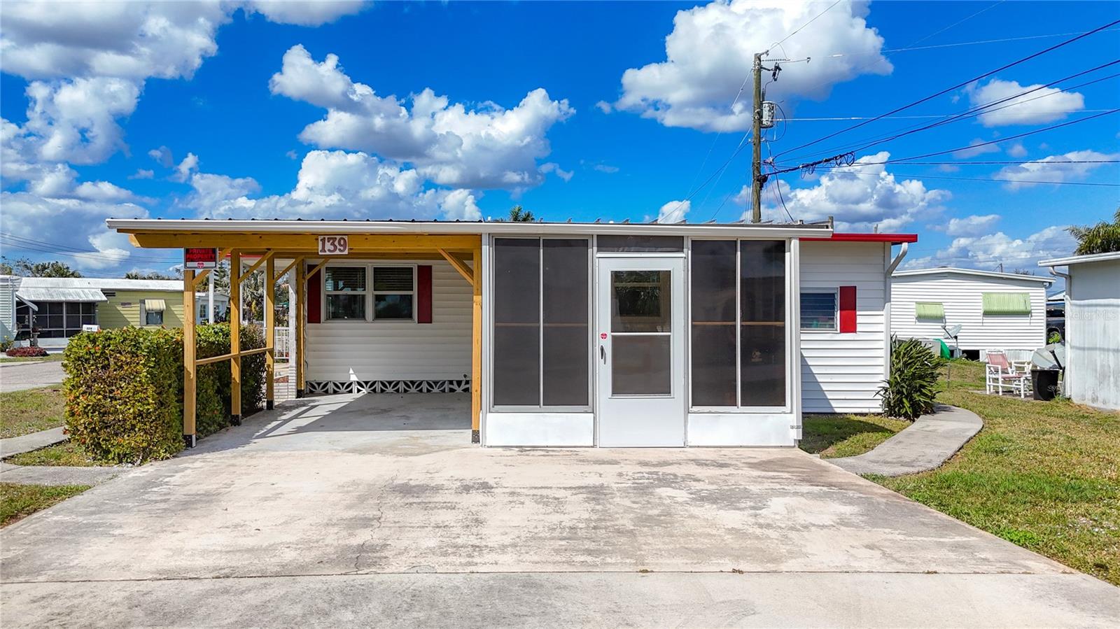 Located at 139 Gaslight Avenue, North Fort Myers, FL 33917, this 2B/1B home with a half bath and enclosed lanai is an affordable winter home or could be a new permanent home, or an investment property in Southwest Florida.  The kitchen features a gas stove and an eating space with a snack bar. The master bedroom has his/her closets and office space that goes out to the lanai.  New Roof (2022), and the carport was recently rebuilt.  The home is in MOBILE MANOR, a friendly community of seasonal and year-round residents.  There are no lot fees, and you own the home's land.  Conveniently located near shopping, dining, parks, and easy access to I-75, RSW International Airport, and our world-famous beaches.  This property is being sold AS IS.  Make an appointment today!