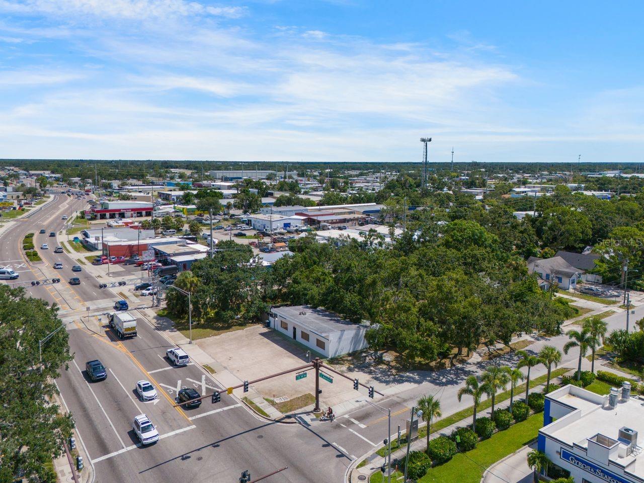This 0.66-acre corner parcel is positioned at the highly visible, signalized intersection of US 301 (Washington Boulevard) and 10th Street, offering unmatched access, visibility, and versatility for forward-thinking developers. The property package includes a strategically located office building with a spacious driveway and dual ingress/egress onto both Washington Boulevard and 10th Street, as well as an income-producing residential unit that provides immediate cash flow while future development plans take shape.

With its DTE zoning, the site is primed for modern mixed-use development, encouraging residential, office, retail, or live/work concepts. A recent site plan proposed for the property envisioned a four-story mixed-use building featuring 36 residential units and approximately 7,700 square feet of office space, showcasing the strong development potential within this zoning framework.

The location provides exceptional traffic exposure and connectivity, situated directly on US 301 with quick access to Fruitville Road (SR 780), Downtown Sarasota, and Interstate 75. Just minutes from the city’s cultural venues, waterfront, and thriving restaurant scene, the property also benefits from strong walkability and bikeability, appealing to residents and professionals seeking an urban lifestyle.