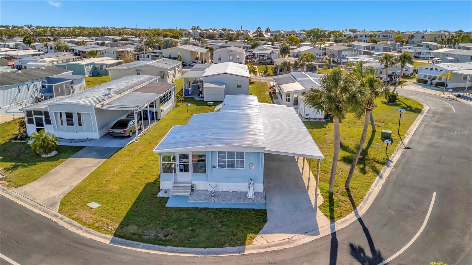 Welcome to Caribbean Isles, a vibrant 55+ gated waterfront community where friendly neighbors and resort-style amenities make every day feel like a vacation!
This charming 2-bedroom, 1-bath home is truly move-in ready and filled with updates that providing peace of mind. Don't let its age fool you, recent upgrades include a new roof, HVAC system with updated ductwork, washer and dryer, and a brand-new carport. Inside, natural light fills the living room and hallway, highlighting the stylish laminate flooring. The spacious primary bedroom easily accommodates a king-sized bed and boasts 10 feet of in-wall closets for all your storage needs.
Love the outdoors? You’ll feel right at home here! Launch your kayak or boat from our private facilities and explore the scenic canal system with direct access to Tampa Bay. Prefer to stay on land? Join a friendly game of bocce ball, shuffleboard, or horseshoes. When it's time to unwind, take a dip in our heated year-round pool or head to the clubhouse, where you’ll find a craft room, game room, pool tables, card tables, bar shuffleboard, and darts—perfect for socializing and having fun.
There’s always something happening in Caribbean Isles! Our community events and activities range from themed dinners and dances to exciting social gatherings that make it easy to connect with neighbors and enjoy an active lifestyle.And let’s not forget the unbeatable location located between Tampa and Sarasota/Bradenton, you're just a short drive from stunning beaches, world-class dining, shopping, and thrilling amusement parks.Come see for yourself why so many call Caribbean Isles home.