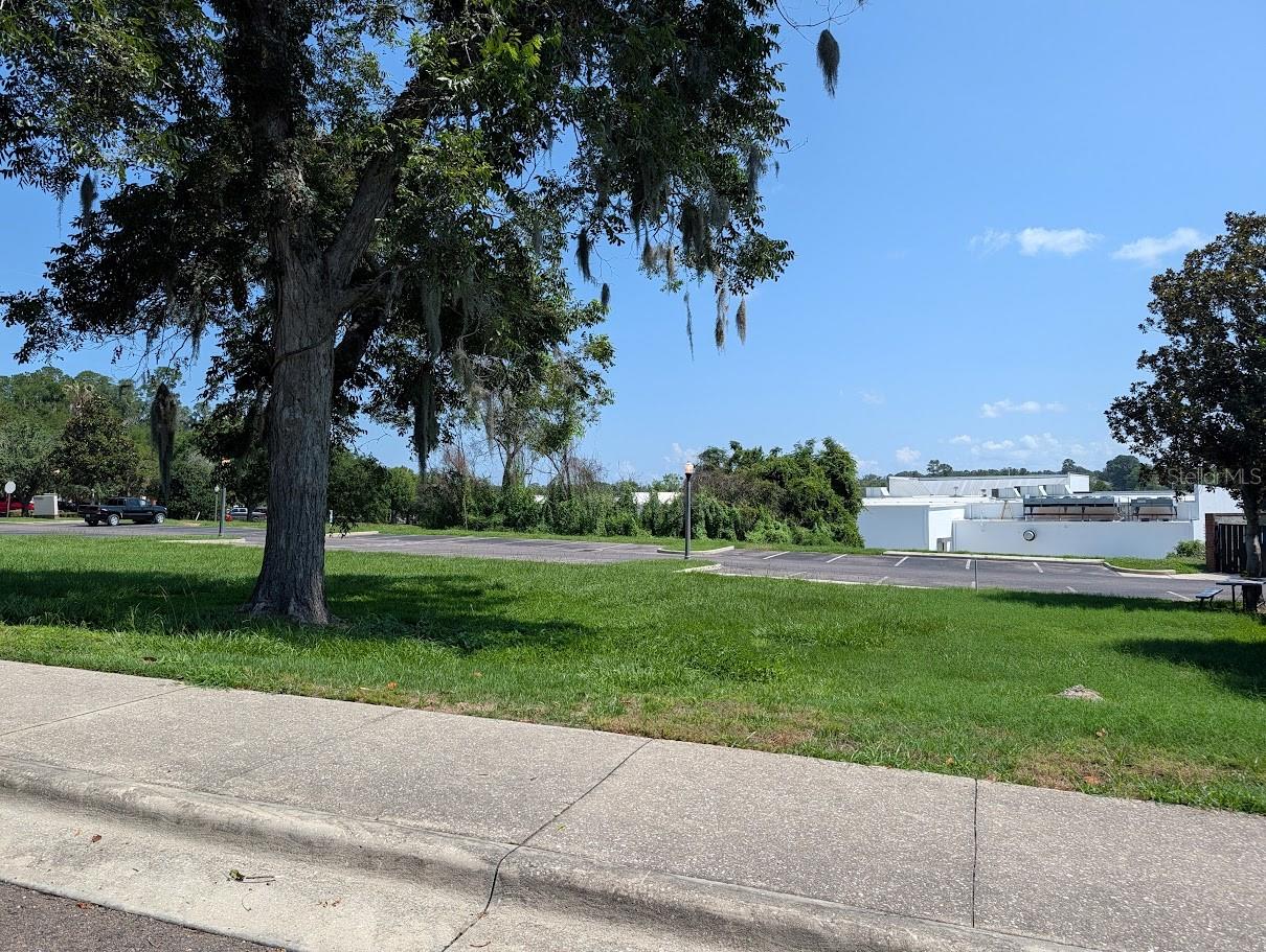 Prime commercial PUD parcel available in the rapidly growing City of Alachua  at the Alachua Towne Center, conveniently located behind Hitchcock's and adjacent to Windswept Hills Subdivision (Downing Addition). The current owners have completed extensive due diligence, including engineering studies and a site plan for a proposed 2,500 SF building. PUD zoning allows for office and mixed-use development, offering excellent flexibility for a variety of business uses. This property is subject to deed restrictions designed to maintain the quality and appearance of the development. This is an open builder opportunity with paved parking already in place to serve the development and individual parcel.  Additional adjoining parcels may be available for purchase if a larger development footprint is desired. Ideally located just minutes from I-75 in one of Alachua's fastest-growing commercial corridors, this property offers an outstanding opportunity for investors, business owners, and developers.