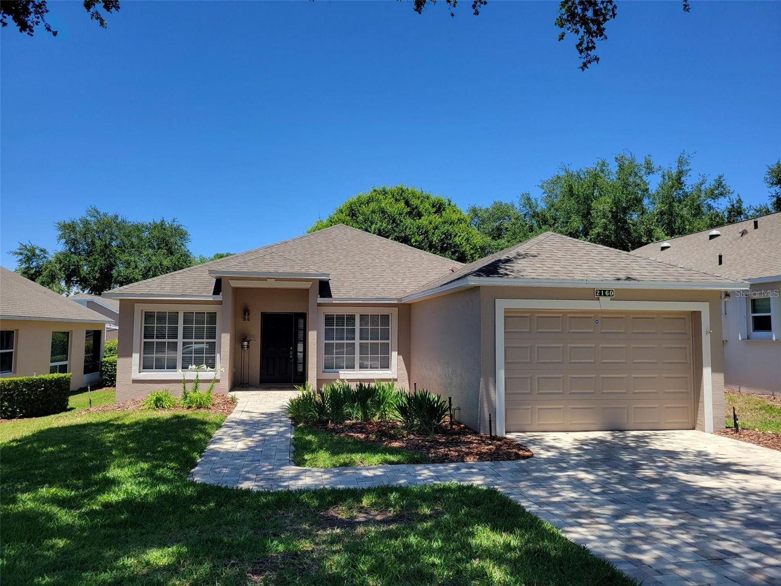 Come see this Clean and Well-Maintained Home in the Aberdeen Community of Sought-After 55+ Kings Ridge. This is a Crown Model featuring a Large Living and Dining Room Combination Floorplan. This Home Features 2 Split-Plan Bedrooms and 2 Bathrooms in 1334 Square Feet of Living Space, a Den/Office, and a Kitchen with Breakfast Nook, Separate Laundry Room and 1 Car Garage with a Door Opener. Home has Luxury Vinyl Flooring throughout the Home, so enjoy no Carpet anywhere. Enjoy time on the Fully Enclosed Covered Florida Room or the Screened Enclosed Lanai at the back of the Home. Home has Ceiling fans in the Living Room and both Bedrooms for Cooling Comfort.  Newer appliances in the Kitchen.  Washer & Dryer are also included in the Sale, as well as the Furnishings if wanted by the Buyer.  The Seller has not occupied the property, so there is no Seller Disclosure available, although building permits were pulled in 2018 for the roof and 2014 for a HVAC replacement. Enjoy the Safety of a Guard Gated Community and Beauty of Tree-Lined Streets and Amazing Community Amenities including a Multi-Million-Dollar Royal Clubhouse. Live the Royal lifestyle with two 18-Hole Golf courses, Three Heated pools, Two Fitness Centers, Spas, Tennis & Pickleball Courts, Billiards, Shuffleboard, Shows, Bingo, Dancing, Cards, Crafts, Movie & Food Truck Nights and Join any one of the Many Clubs Galore. HOA dues include Lawn Maintenance & Irrigation, Exterior Painting, Landline Phone, Basic Cable and Internet and all Community Amenities. Close to Highway 27 and 50, Florida Turnpike with easy access to Downtown Orlando within 30 minutes & twenty-two miles to Disney. Conveniently Located Outside the Community: Golf Cart Accessible Publix, University of Florida Urgent Care Center, Doctors, Dentists, Walgreen’s Pharmacy, Quest and close to Costco, Kohls, Walmart, Target, BJs and Numerous Restaurants within five miles. At least one buyer must be at least 55 years old or older for HOA approval and pay a one-time $1500 Capital Contribution to the Aberdeen HOA at closing. Call for a private tour of this fantastic home.