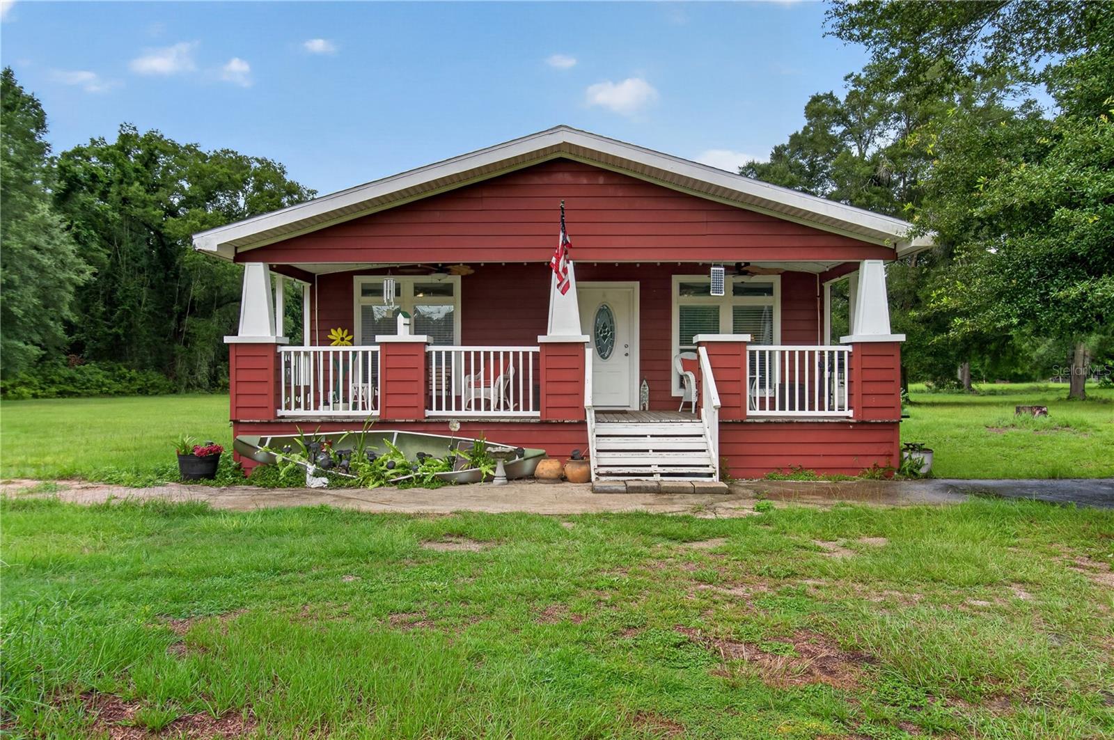 Welcome to this charming and well-maintained double-wide manufactured home nestled on 5 peaceful acres in Trenton, offering the perfect blend of country living and everyday comfort. With 1,440 square feet of heated living space, this 2-bedroom, 2-bathroom home is full of character and thoughtful features throughout.

Inside, you will find a spacious living room with vaulted ceilings and crown molding that give the home an open, airy feel. The generous kitchen includes a built-in oven, cooktop, microwave, and refrigerator, with an eating space that makes it a natural gathering spot for family and friends. Ceiling fans throughout keep things comfortable year round, and the split bedroom layout provides privacy for everyone in the home.

The primary suite is a true retreat, featuring a walk-in closet and a private bathroom with dual vanities and a walk-in shower. The second bedroom offers a built-in closet and its own convenient bathroom access. Flooring is a combination of carpet and tile throughout the home.

Step outside and enjoy the expansive wraparound porch, perfect for soaking in the tranquility of your surroundings and watching the sun set over your own private slice of North Central Florida. The wide open yard offers plenty of room for outdoor activities, gardening, or simply enjoying the peace and quiet that acreage living provides.


If you have been dreaming of wide open spaces without sacrificing comfort, this one is worth a look. Schedule your showing today!