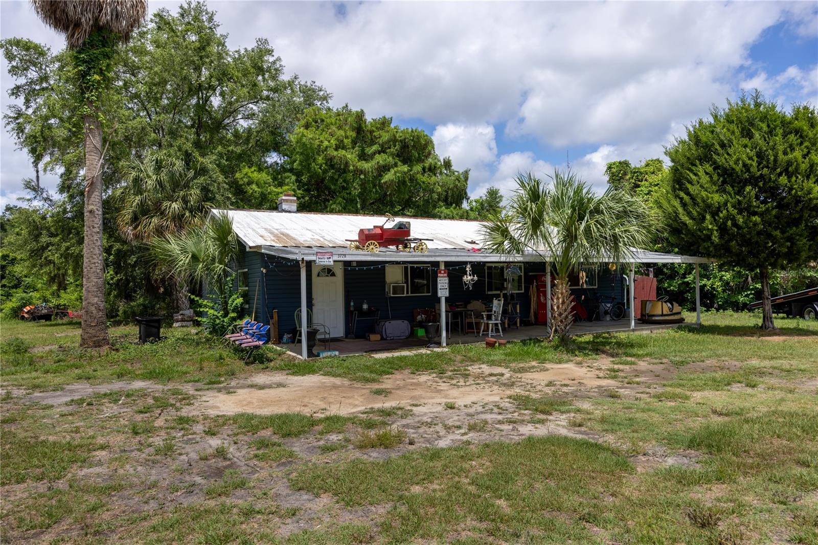 Rare opportunity to acquire a versatile commercial property in a prime Ocala location with exceptional future potential. Situated on 2.73 acres and zoned B-4 Commercial, this property features an approximately 1,000 square foot home that can serve as an office, rental property, business headquarters, or redevelopment opportunity depending on your vision and operational needs.
Positioned in a rapidly growing corridor, the property offers flexibility for investors, business owners, and developers alike. The B-4 zoning supports a wide range of commercial uses, making this an attractive option for those seeking both immediate functionality and long-term upside.
For buyers seeking additional acreage and expanded commercial potential, this property may also be combined with MLS GC540200, creating a combined total of more than 3.75 acres. Together, the properties present an outstanding opportunity for expansion, increased operational capacity, or larger-scale commercial development in a highly visible and accessible area.  Call us for a tour today!