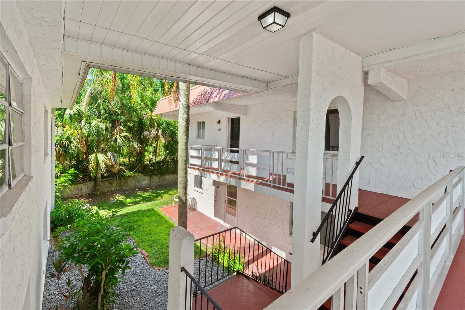 Spacious 2-bedroom, 2-bath upper corner condo in the Barcelona Building of Orchid Springs, an all-ages community. This desirable end unit offers natural light and views from three sides, plus added privacy with minimal foot traffic. Recent updates include luxury vinyl plank flooring throughout, smooth ceilings, and neutral zero-VOC paint. Routine annual A/C maintenance completed in May 2026. The updated kitchen features 17 cabinets, 10 drawers, and a pantry, while the spacious primary suite offers a walk-in closet and en-suite bath. Assigned parking is located just below the unit. The monthly HOA fee of $312.69 covers exterior maintenance, grounds care, water, sewer, trash, gas service, pest control, common laundry facilities, and capital reserves. Conveniently located near LEGOLAND Florida and between Orlando and Tampa, with easy access to Winter Haven's renowned Chain of Lakes.
