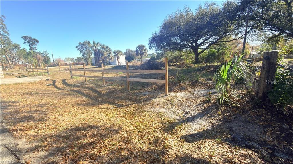 Spacious 0.32-acre vacant parcel in North Fort Myers. Zoned for mobile and manufactured homes, this versatile property allows for a mobile home, manufactured home, RV, or even a custom-built single-family residence. The lot is partially cleared and features an electrical pole located at the back right corner—adding convenience as you plan your build. Enjoy the benefits of a paved road, no HOA restrictions, and peace of mind knowing the property is not located in a flood zone—an increasingly hard-to-find combination. Ideally positioned with quick access to Del Prado Blvd N, Bayshore Road, US-41 (Tamiami Trail), and I-75, you’ll appreciate the ease of commuting and proximity to shopping, dining, and everyday essentials. Whether you’re planning a primary residence, seasonal retreat, or investment property, this lot offers flexibility and opportunity in a rapidly growing area.