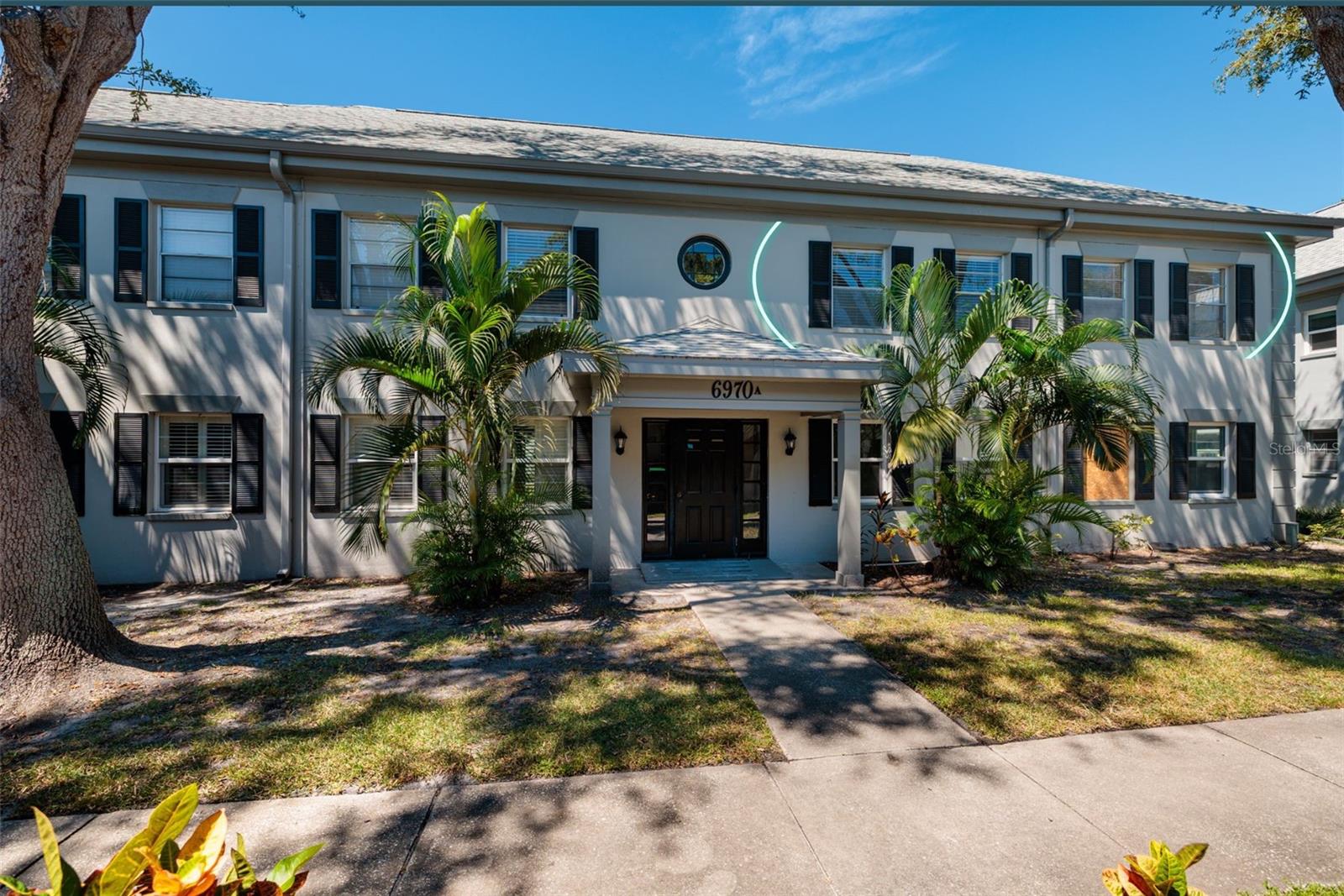 ASSUMABLE 2.99% VA LOAN (buyer doesn’t need to be a veteran for this opportunity; receive & lock in the 2.99% interest rate). Welcome to your tropical oasis! This gorgeous TOP FLOOR CORNER UNIT is nestled just off beautiful BOCA CIEGA BAY, right in the lively heart of South Pasadena. With a brand new 2025 AC/HEAT system, 2023 WATER HEATER, and a new front door, you’ll enjoy modern comfort and peace of mind. Sunlight streams in through plenty of windows, letting the gentle bay breezes sweep through your spacious home for a true beachy vibe. The dining area offers tranquil views of the lush, oversized courtyard just outside, with convenient access for sun-filled days or sizzling up a barbecue with friends. The roomy living room is perfect for entertaining guests or simply relaxing with a good book as the palm trees sway outside. Your cozy kitchen features granite countertops and a pantry—ideal for whipping up fresh, tropical-inspired meals while gazing out at the courtyard. Unwind in your generous corner bedroom, complete with a huge walk-in closet for all your resort wear. The bathroom includes a makeup vanity topped with granite and a linen closet for extra storage. Located just steps from the clubhouse, sparkling pool, and laundry facilities, this condo makes resort-style living easy and fun.
For outdoor lovers, stroll down to BayView Park for a tennis match or a scenic walk along Boca Ciega Bay’s waterfront paths. Across
the street, the botanical garden provides a peaceful escape among lush greenery. Enjoy a quick 12-minute bike ride (or 8-minute drive) to the powdery sands of St. Pete Beach on the Gulf of Mexico, or hop on the Sun Runner to check out the vibrant beach bars and restaurants. Essentials like groceries, pharmacy, and banking are just around the corner, and you’ll find iconic eateries down the street for hosting friends and family in style. South Pasadena is packed with parks on Boca Ciega Bay, and a short drive or Sun Runner trip lands you in Downtown St. Petersburg with its world-famous museums, trendy restaurants, and lively pier on Tampa Bay. For an artsy day out, visit Gulfport’s colorful Beach Blvd, featuring unique art walks and funky bars. Nature enthusiasts will love the easy 26-minute trip to Ft Desoto Park, a 1,136-acre paradise perfect for beach days and relaxation. Tampa International Airport is just 31 minutes away, making travel a breeze—whether you’re jetting off or catching a luxury cruise from the Tampa Port to the Caribbean. Claim your piece of paradise today—this tropical retreat is calling your name!