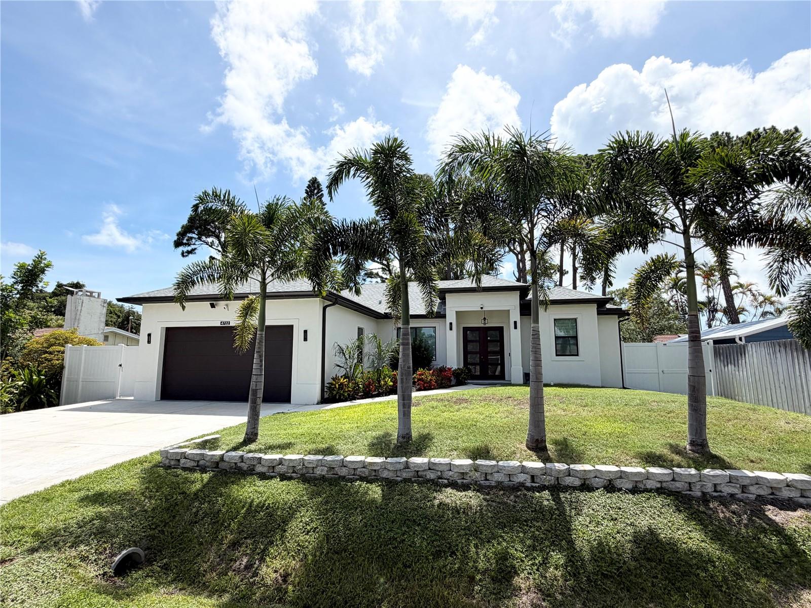Welcome to this fully furnished, beautifully maintained, and move-in-ready 3-bedroom, 2-bathroom pool home in South Venice. This home offers the perfect blend of comfort, modern style, and an excellent location. Conveniently located just 10 minutes from Manasota Beach and 15 minutes from Venice Beach, Historic Downtown Venice, and Wellen Park, this property provides easy access to beaches, trails, dining, shopping, and entertainment. Designed with an open-concept layout, the home features high ceilings, abundant natural light, and luxury vinyl flooring throughout, creating a bright and inviting living space. The spacious living area flows seamlessly into the kitchen and dining areas, making it ideal for both everyday living and entertaining. The well-appointed kitchen features quartz countertops, stainless steel appliances, a large island with bar seating, modern cabinetry, and a pantry for additional storage. The generously sized primary suite accommodates a king-size bedroom set and includes a walk-in closet and an en-suite bathroom with dual vanities, quartz countertops, and an oversized walk-in shower. Step outside to a private screened lanai featuring a heated saltwater pool, surrounded by paver decking and a covered seating area, providing the perfect space to relax or entertain year-round. The fully fenced backyard offers added privacy and plenty of room to enjoy the outdoors. Additional features include an interior laundry room, an attached garage, and a well-maintained yard with mature landscaping. Pool maintenance included. This home presents an excellent opportunity to enjoy the Florida lifestyle in a desirable and convenient Venice location. Don't wait—schedule your private showing today and start enjoying Florida living!!!