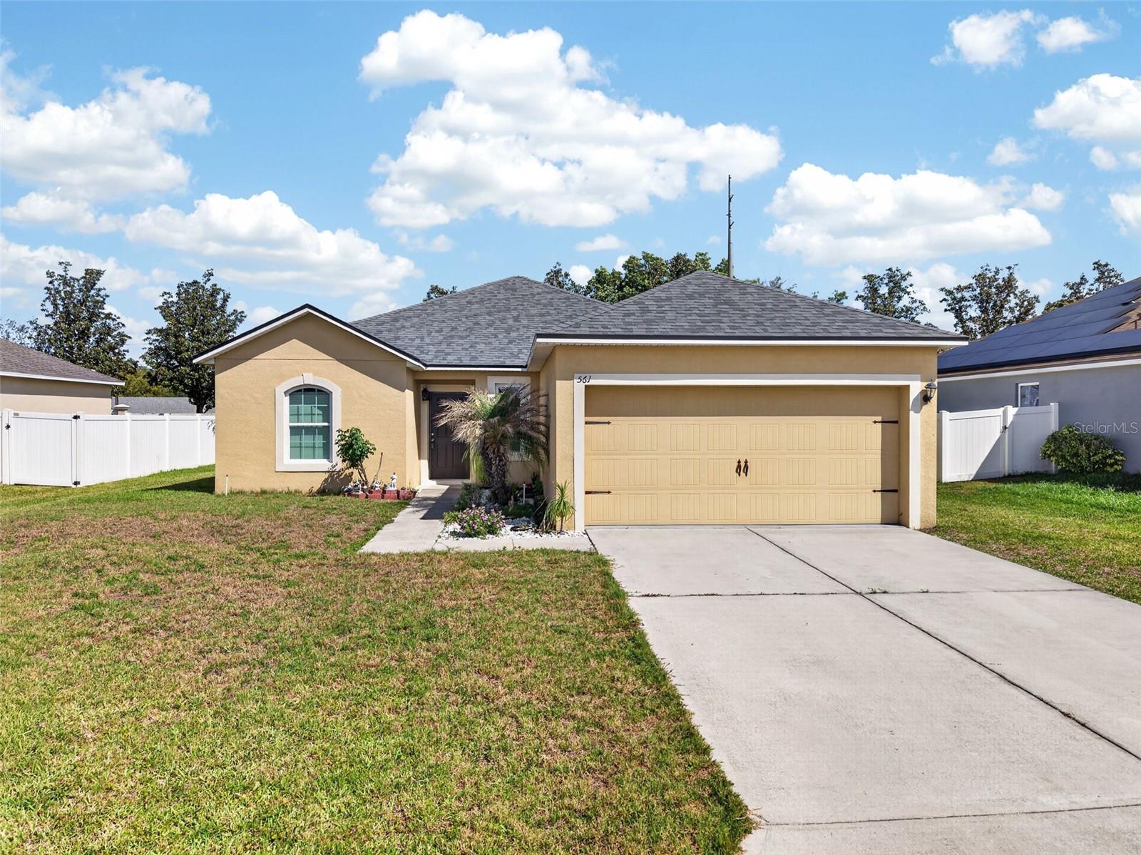 Welcome home to 561 Lake Cummings Way Lake Alfred, FL
Built in 2016, this well-maintained home delivers modern construction, functional design, in one of Polk County’s growing residential communities.
Inside, the open-concept layout does exactly what buyers want kitchen, dining, and living flow together naturally, whether you’re hosting or just winding down. The primary suite is private, the bedroom sizes are comfortable, and there’s flexibility for a home office or guest setup. Natural light throughout makes the whole home feel bigger than it is.
But the real story here is where this home sits.
LEGOLAND Florida is about 11 miles away, and Walt Disney World is roughly 29 miles out  close enough to enjoy, far enough to avoid the tourist congestion. Winter Haven, Lakeland, and Orlando are all within easy reach , giving you access to major employment, shopping, and entertainment without paying their price tags.
Right at your doorstep, Mackay Gardens and Lakeside Preserve offers nature trails, a canoe launch, and a lakeside park , while Lion’s Park gives you access to freshwater fishing and the waters of Lake Alfred itself . The Chain of Lakes Trail is about a mile away, connecting Lake Rochelle and Highway 92 for a scenic 3.2-mile walk or ride .
On the commercial side, the US-27 and Highway 92 corridor is actively expanding new retail including a Target and surrounding shopping centers are bringing everyday convenience and long-term value growth directly to this area.
Whether you’re buying to live here or investing in a market that’s still ahead of its growth curve, this one checks the boxes. Modern build, strong location, real lifestyle amenities nearby.
Schedule your private showing today.