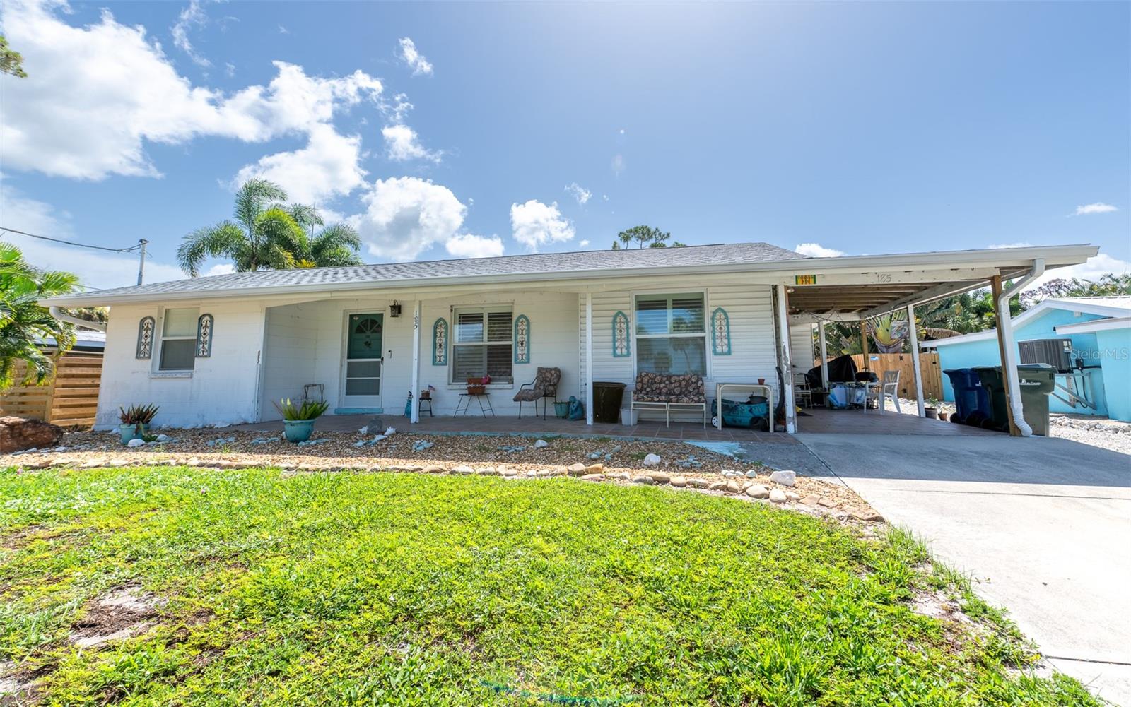 Virtually Staged. Old Englewood Charm Meets the Florida Lifestyle You've Been Searching For!

Imagine starting your morning with coffee on the front porch as boats drift across Lemon Bay, then ending your day with spectacular waterfront sunsets just steps from your front door. Located in one of Old Englewood's most desirable neighborhoods, this charming 3-bedroom, 2-bath home offers the perfect blend of character, convenience, and coastal living.

Just a short walk from Indian Mound Park, you'll enjoy a public boat ramp, fishing pier, kayak launch, beach area, picnic pavilions, and beautiful views of Lemon Bay. Hop on your golf cart and head to historic Dearborn Street, where you'll find locally owned restaurants, boutique shopping, art galleries, live entertainment, and seasonal farmers markets. Best of all, you're only 10 minutes from Englewood Beach and 15 minutes from Manasota Key Beach, making every day feel like a vacation.

Inside, you'll appreciate the timeless terrazzo floors, plantation shutters, and an updated kitchen featuring butcher block countertops and modern appliances. The home offers warm, inviting spaces that perfectly complement the relaxed coastal lifestyle.

The backyard is designed for both privacy and possibility, featuring a fenced yard, multiple storage buildings, and a versatile approximately 400-square-foot air-conditioned detached studio that's currently being used as a private mother-in-law suite. Complete with its own kitchenette and full bath with shower, it's ideal for extended family, guests, a home office, a creative studio, hobby space, or workshop.

Bring all your Florida toys—there's plenty of room for your boat, RV, golf cart, kayaks, and additional parking. The lot also provides ample space to add the pool of your dreams and create your own backyard oasis.

Whether you're looking for a full-time residence, seasonal getaway, or investment opportunity, this home delivers the lifestyle buyers are seeking—water access, walkability, beach proximity, flexible living space, and the unmistakable charm of Old Englewood—all without the premium price of waterfront property.

Drone photos will be uploaded Sunday 719/26