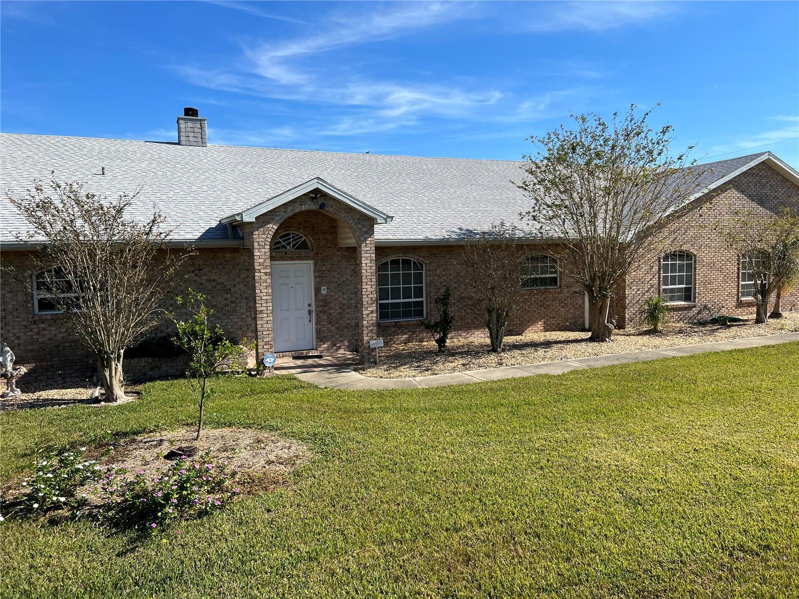 See this stunning custom built home with 3 Bedroom 3.5 bath estate. Spanning 4528 square  feet, this home has an L shaped kitchen with a built in breakfast nook, granite counter tops and state of the art appliances. The inviting Great room centers around a striking brick fireplace with a beautiful view of the entire 4.67 acre farm and beyond. Each bedroom has its own walk in closets and own bathroom. House is zoned where owner could have horses and is fully irrigated with two wells. One 8 inch with diesel motor and one 5 inch for the home and landscaping. Irrigation was set up for Blueberries or could be used for a nursery. Could build two more homes for a multi-generation complex.