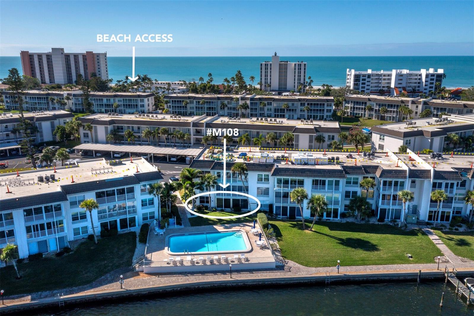 Stunning Sarasota Bay Views from a Move-In-Ready First-Floor Spacious Corner Unit!
Wake up to breathtaking, unobstructed Sarasota Bay vistas in this turnkey first-floor corner residence, designed with upscale Tommy Bahama–inspired flair. This exceptional home blends luxury island living with immediate rental potential, offering panoramic water views from both the primary and guest bedrooms, while the pool lies just steps from your private patio.
Elegantly remodeled, the home showcases porcelain tile floors, solid doors, crown molding, granite windowsills, and solar film on rear windows and sliders for added privacy and comfort. The open, light-filled kitchen is a chef’s delight, featuring solid wood cabinetry, granite countertops, stainless steel appliances, and a double oven range. Both bathrooms are thoughtfully updated with cast-iron tubs, granite countertops, and dedicated heat and air vents.
Additional highlights include a full-size in-unit washer and dryer, a large water heater, and covered parking space #67 . The residence comes with a long-standing seasonal tenant and a transferable lease.
Located in the premier M Building at Longboat Harbour, residents enjoy resort-style amenities including a private gated beach club(4415 Gulf Of Mexico dr ), four heated   pools, tennis and pickleball courts, fitness center, kayak storage, and boat docks on first come base- power and sail boats. A new roof is underway with assessment already paid, and no storm damage has occurred.
This is a rare opportunity to own a move-in-ready, elegantly upgraded waterfront retreat in one of Sarasota’s most sought-after communities.