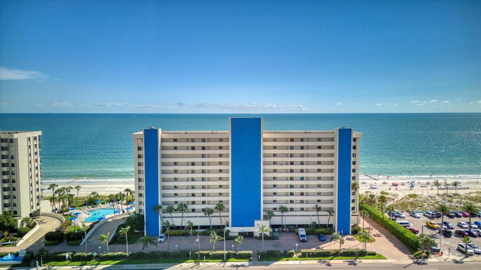 Stunning Gulf-Front Condo in Ocean Sands – Fully Renovated & Turnkey!  Welcome to your dream beachfront retreat in the highly sought-after Ocean Sands community. This beautifully renovated Gulf-front residence offers breathtaking, unobstructed views of the Gulf of Mexico from the moment you step through the front door.

Thoughtfully updated throughout, this turnkey condominium features new furnishings, designer lighting, an upgraded kitchen, modernized bathrooms, and stylish finishes that create a sophisticated coastal atmosphere. Whether you're seeking a full-time residence, vacation getaway, or income-producing investment property, this exceptional unit is move-in ready and rental-ready.

Relax and unwind on the expansive private balcony while enjoying spectacular sunsets, gentle sea breezes, and the soothing sounds of the Gulf. Inside, both spacious bedrooms have been tastefully upgraded, featuring luxurious walk-in showers, a generous walk-in closet in the primary suite, and an oversized closet in the guest bedroom.

The beautifully renovated kitchen showcases updated cabinetry, modern appliances, and stunning water views, while the bathrooms reflect quality craftsmanship and elegant design.

This property boasts a strong rental history and benefits from Ocean Sands' flexible two-week minimum rental policy, making it highly desirable for vacation renters and investors alike.

Ocean Sands offers an impressive array of resort-style amenities, including a Gulf-front heated swimming pool, hot tub, shuffleboard court, tiki hut, grilling area, secure under-building reserved parking, and a private storage locker conveniently located near the elevators.

Ideally situated in the heart of Madeira Beach, you'll be just steps from local restaurants, shopping, and entertainment, including the popular Cambria Hotel rooftop bar. Enjoy easy access to ROC Park with its pickleball courts, concerts, and community events, while John's Pass Village & Boardwalk is only minutes away. Downtown St. Petersburg and Tampa International Airport are also within convenient driving distance.

Additional highlights include:
• Completed Milestone Inspection
• Strong HOA reserves
• Excellent rental income potential
• Ideal for full-time residence, seasonal living, or vacation rentals
• Convenient proximity to the VA Hospital and nearby accommodations for visiting guests

Don't miss this rare opportunity to own a beautifully renovated Gulf-front condominium in one of Madeira Beach's most desirable communities.