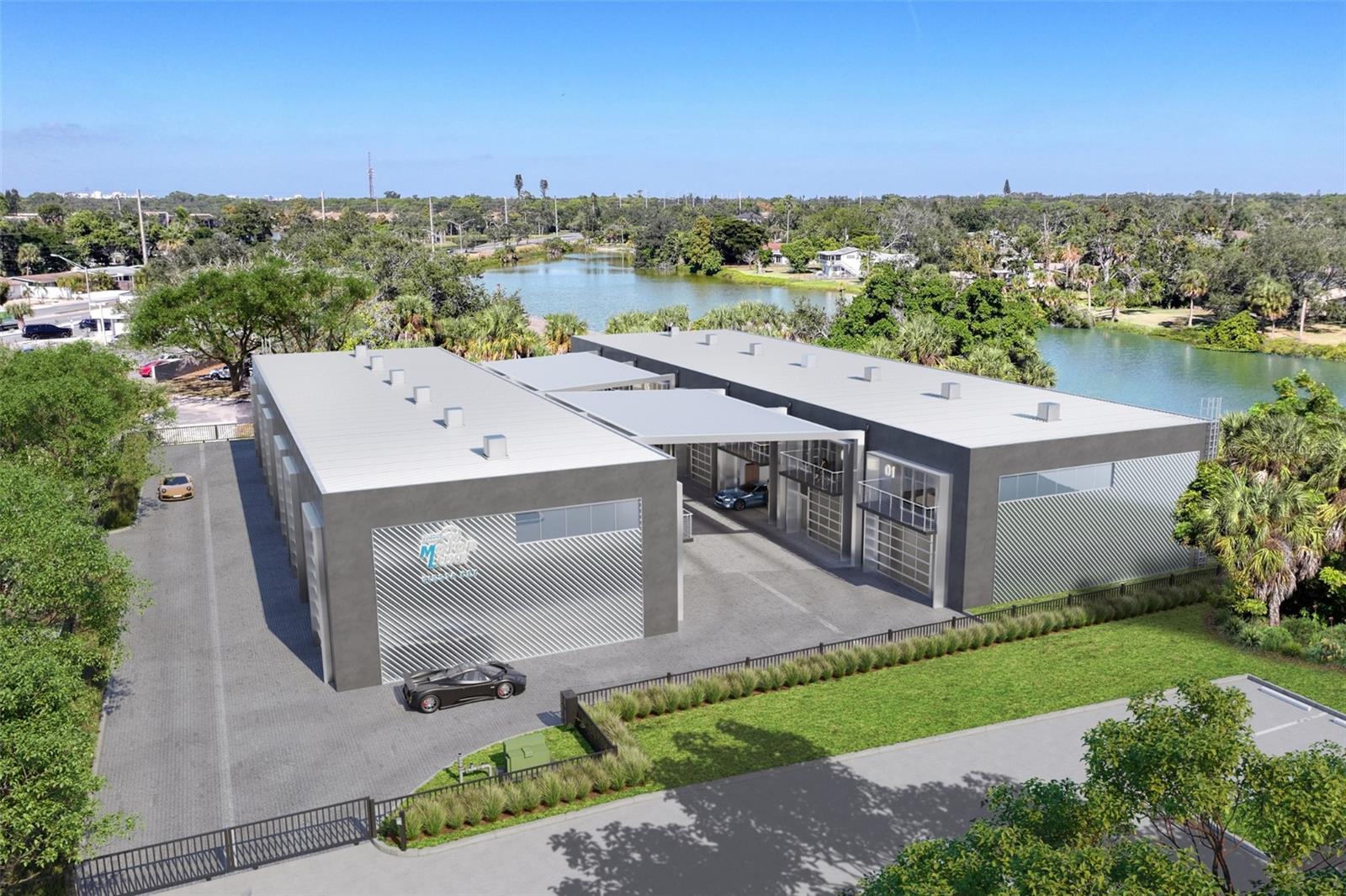 Pre-Construction. To be built. Introducing MotorLuxe Suites Siesta Key—an owner-only private garage community designed for the high-end automotive lifestyle. The property features a private road with dual secured entry gates providing controlled access. There are 13 individually owned garage condominiums, including units with beautiful views of Clark Lake. The seven lakefront units offer approximately 1,152 square feet (24’ W × 48’ D) and feature a (14’ W × 10’ H) fully insulated, motorized garage door with a separate pedestrian entry door, along with two private balconies and 24-foot ceiling heights. A 24-hour security monitoring system provides continuous monitoring and added protection. Buildings are constructed with solid concrete tilt-wall construction designed to withstand up to 150-mph hurricane-force winds. Interior features include fully insulated walls, an efficient climate-controlled split HVAC system, a half bathroom, utility sink, quality concrete floors, a fire sprinkler system, high-speed internet wiring, multiple GFCI outlets, and wide driveways for easy vehicle maneuvering. The community is well-lit and secured with perimeter fencing. Owners can enjoy lake views from their private space, with the flexibility to include a private office within the garage suite, take advantage of kayak access, or relax and entertain family and friends in a beautiful environment. Each unit allows extensive customization, offering the flexibility to create a personalized retreat and secure haven for prized vehicles and collectibles. Situated approximately 24 feet above sea level, the property provides an added advantage as a desirable hurricane evacuation location. Conveniently located just one-half block east of Beneva Road on Clark Road, the community is only minutes from Siesta Key. Discover the opportunity to create a space that fits your lifestyle.