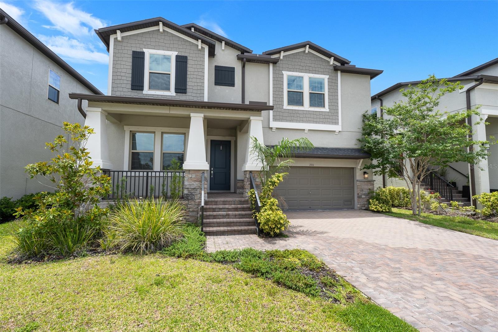 In the heart of South Tampa, this gorgeous four-bedroom, three-bath home is a balance between modern style and everyday comfort. From the moment you enter onto the inviting front porch and through the 8-foot entryway, you’ll love how bright, airy, and open the space feels thanks to soaring 10-foot ceilings and sleek, contemporary finishes. At the center of it all is a stunning kitchen made for entertaining, featuring granite countertops, a large island with seating, matte steel GE appliances, and a huge walk-in pantry with automatic lighting and custom built-ins. The main level offers a flexible guest bedroom ideal for a home office or multi-generational living while upstairs opens to a massive loft that is waiting to become your next movie night spot or playroom. The oversized primary suite is a retreat, boasting a spa-like en suite with a sizable walk-in shower, dual sink split vanity, and a large walk-in closet with custom built-ins and motion censored lighting. Slide open the glass doors to your private, screened lanai overlooking the fully fenced backyard, your personal retreat for ultimate relaxation. This South Tampa gem places you right in the center of it all! Enjoy effortless access to downtown Tampa, Tampa International Airport and MacDill Air Force Base. When it is time to unwind, you are just minutes from popular South Tampa shopping and dining, local waterfront parks, and the sandy shores of Picnic Island Park and Dog Beach. With major commuter routes nearby, this home offers the ultimate Tampa lifestyle.