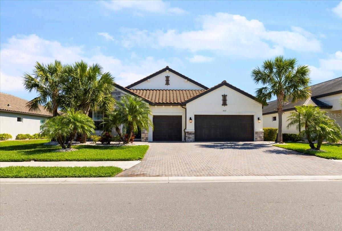 Motivated Seller!!! This immaculate one-story Crystal model from MI homes offers 4 bedrooms and 3 bathrooms in the prestige community of Woodleaf at Lakewood Ranch. This is luxury in paradise, don’t look any further!!! You walk into an ample foyer that takes you to find 2 bedrooms to the left with a full bathroom that has being enclosed with a barn door to provide privacy. At your right, you can find the landing from the garage with a spacious laundry room. At the end of the hallway, you will enter the open concept great room with kitchen and dining room. To the right of the living room you will find a 3rd bedroom with a full bathroom and at the other side, the primary suite with walk-in closet and double door for the spa style primary bathroom. 

The back part of the house will lead you to a magnificent yard thru glass sliding doors. The extended lanai will finish with a custom-made cedar gazebo overlooking the custom-made heated pool. The yard has artificial turf for natural look, pets or exercise. This gem has custom curtains, window shades, 29 solar panels covering 100% production, floored attic for storage, connection for electrical car charger, irrigation, hurricane shutters, manicured landscape, water filtration system with osmosis, tile roof, a gym setup,  etc. 

This very well-located property is one of the few communities close to I-75 within Lakewood Ranch to make it easy drive to Sarasota, St Pete and Tampa. With top rated school zone, this property can be yours, just call NOW for a showing and don’t miss this great opportunity.