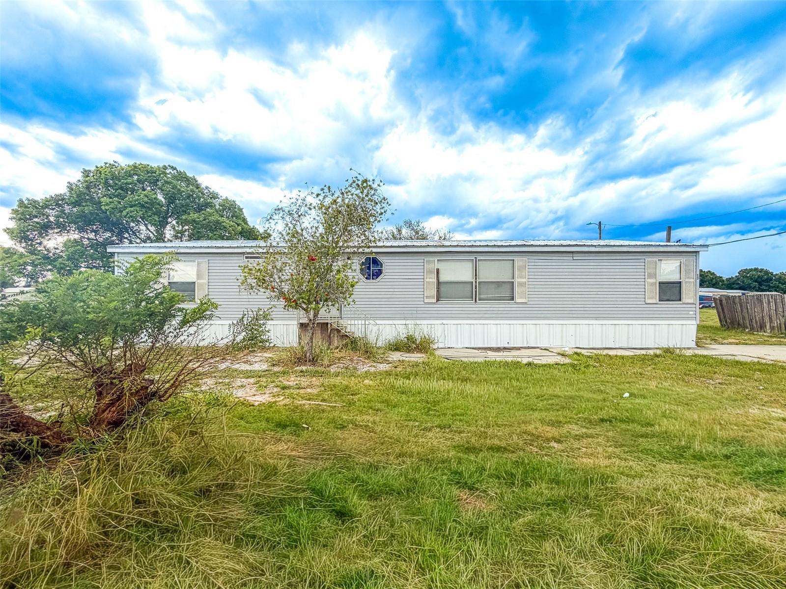 This 3-bedroom, 2-bath home is located in the established Thornhill Estates community with no HOA. Situated on a spacious lot just under one acre, the property offers plenty of outdoor space along with four storage sheds for all your storage, workshop, or hobby needs. The washer and dryer are included, adding extra convenience for the new owner. Conveniently located near shopping, dining, schools, and major roadways.