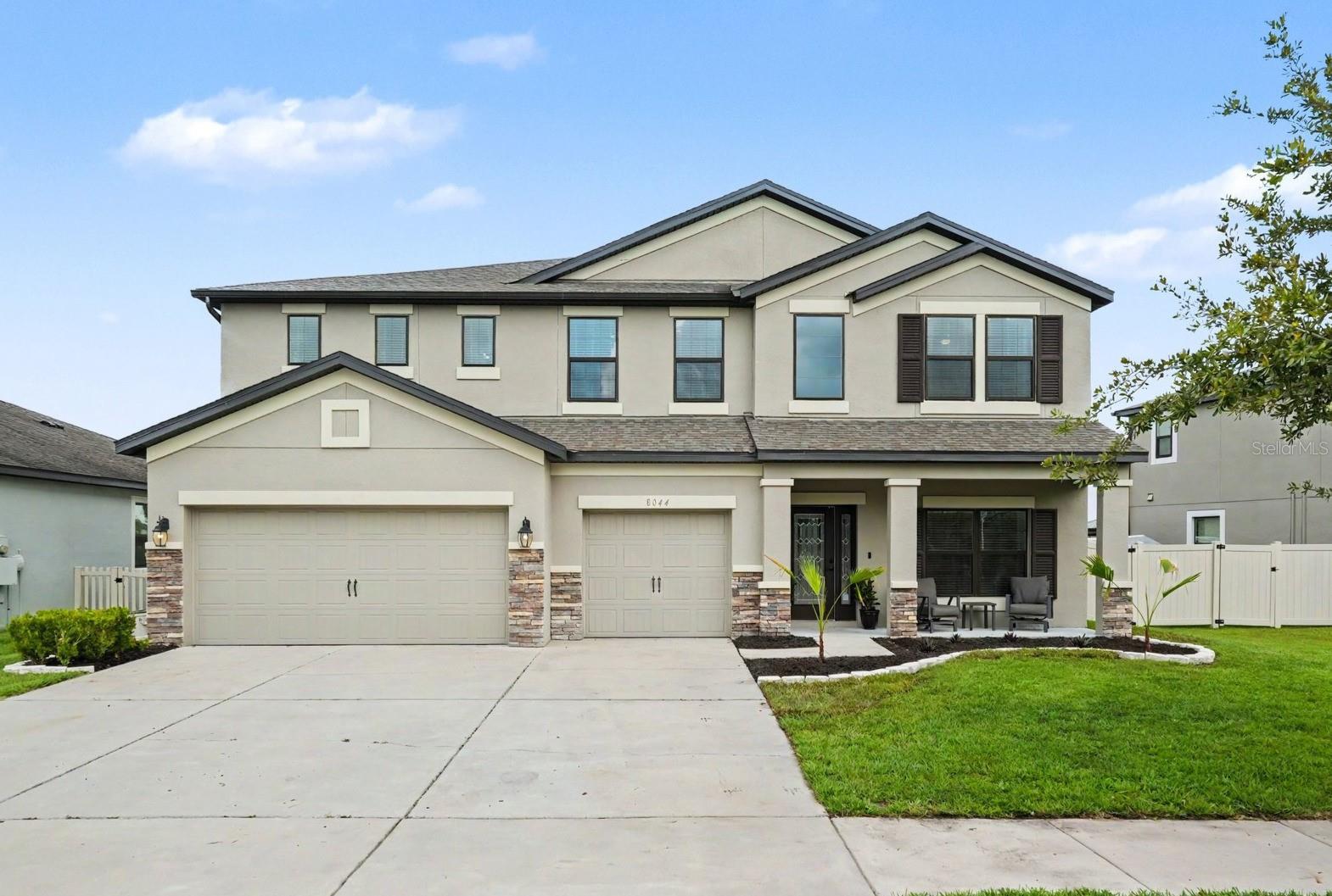 If you are looking for a home with plenty of space, look no further. As you enter through the glass paneled front door, the first thing you’ll notice is the gorgeous laminate flooring running throughout the downstairs. Directly to the right, there is a large office/flex space with a built-in double desk on one side of the room and built-in bookshelves with a dreamy window seat perfect for curling up with a good book. The bright, open kitchen features modern stone countertops, a stainless steel appliance package and new lighting. The kitchen opens into the large family room and dining area that gives plenty of room for all your entertaining needs. The one downstairs bedroom would be perfect for anyone in need of an in-law suite with the adjacent bathroom & exterior door to the patio. Upstairs, you will find a huge loft, the large primary suite and 3 more spacious bedrooms. The primary suite offers laminate floors, a high tray ceiling, plenty of room for even the biggest furniture, an en suite bathroom with a double sink vanity and his-and-hers walk-in closets with custom shelving & organization systems. Outside, you will enjoy the screened patio on buggy, summer days and you’ll love the worry-free lifestyle of having a fully fenced backyard with a pretty pond view. The three-car garage gives you tons of storage space, perfect for a golf-cart. Epperson Ranch is a golf cart approved community! Living in Epperson Ranch South, you’ll enjoy living the Lagoon life,  spending your days playing in the crystal clear water, the safety of living in a gated community, and other amenities including playgrounds, dog parks, a fish dock and more.