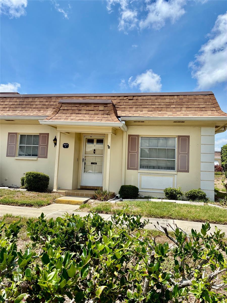 Bring back the sparkle in this SPACIOUS 2/2 Villa....& it will prove to be a smart investment.  Features include the fact that it's located in a great, well-located 55+ community, in-unit Laundry and Covered Patio.  Walking distance to Eagle Lake County Park, shopping & more.  Beaches and airports are a short drive away!  A lot of room here...to do a lot of living! See it soon.