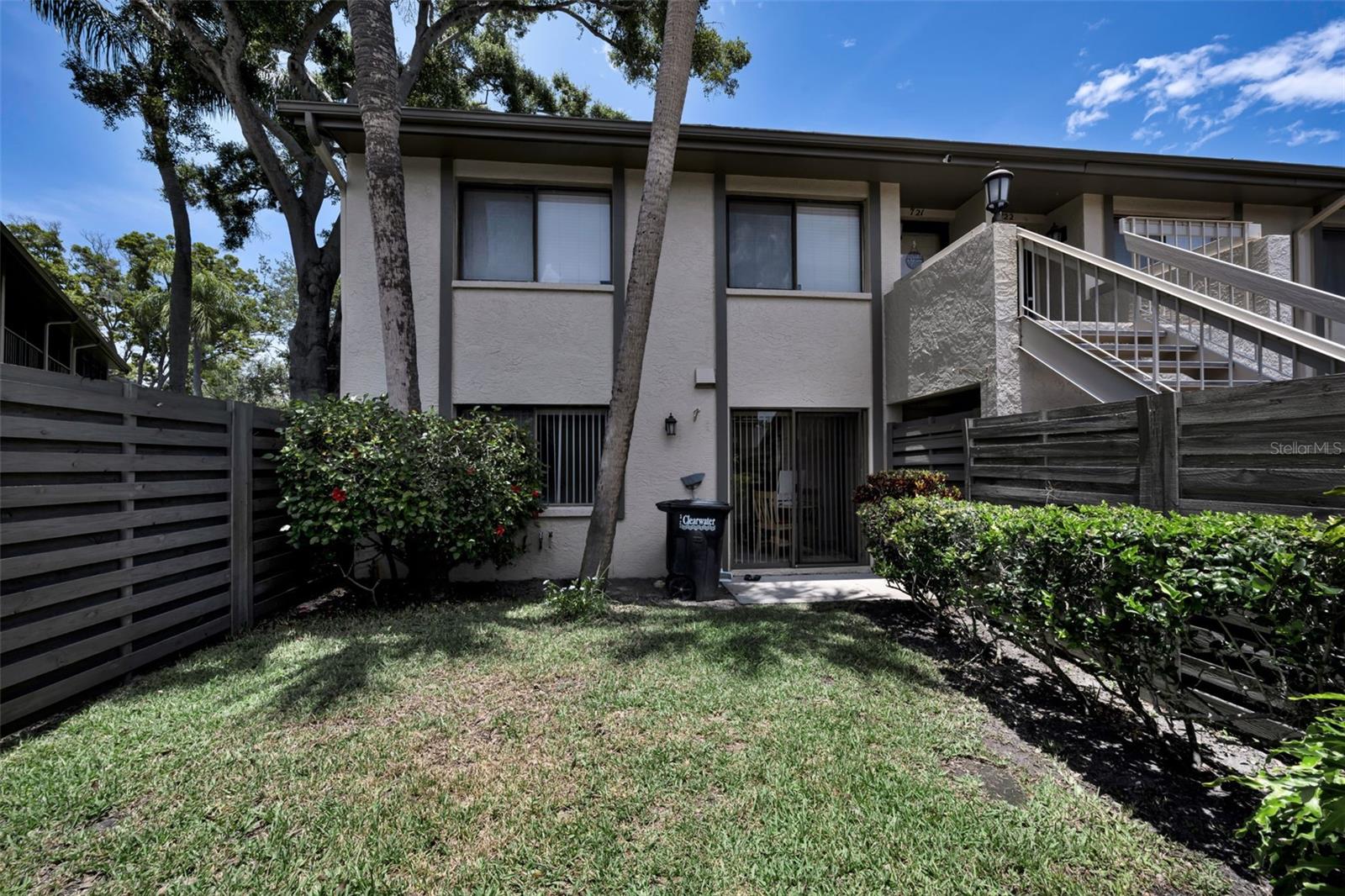 Wow! Beautiful 1st floor Updated POND VIEW 2 bedroom 2 bath in desirable community close to everything with 1 Car Garage. Enter through the foyer and see the Updated Kitchen with all newer cabinets, soft close drawers and stainless steel appliances, along with an eat-in area, pantry and sliders to a garden area. Both baths have been updated with the master having a walk-in shower. Relax on the Screened Lanai and enjoy the quiet pond view. The HOA includes most everything but electric and you are right across from the community pool, tennis & pickleball courts. Water heater 2 years new. Close to restaurants, shopping and 10 minutes to the beach. PRESENT ALL OFFERS!