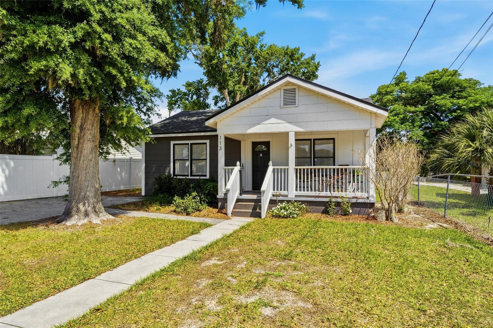 INVESTOR OPPORTUNITY, HOUSE HACK DREAM, OR MULTI-GENERATIONAL LIVING! Welcome to 113 Avenue C SE, Winter Haven, FL, a beautifully maintained and FULLY FURNISHED income-producing property offering exceptional flexibility and value! Situated on a single parcel, this unique property features a charming 3 BEDROOM, 1 BATH main home currently operating as a successful AIRBNB, along with a DETACHED 1 BEDROOM, 1 BATH IN-LAW SUITE with its own private entrance, separate address (258 1st St S, Winter Haven, FL 33880), and alley access, currently rented for $1,100 /MONTH. Both units have been UPDATED, with ROOFS AND A/C SYSTEMS REPLACED WITHIN THE LAST 3 YEARS, allowing peace of mind for years to come. The front home showcases beautiful ORIGINAL HARDWOOD FLOORS, while the rear apartment features attractive WOOD-LOOK TILE flooring. Built in 1950, this property has been exceptionally cared for and is in GREAT CONDITION while maintaining its timeless character. Whether you're looking to HOUSE HACK, generate immediate RENTAL INCOME, accommodate extended family, or expand your investment portfolio, this property checks every box. Located just a SHORT WALK TO DOWNTOWN WINTER HAVEN, you'll enjoy local restaurants, breweries, coffee shops, farmers markets, and year-round community events. Winter Haven continues to experience tremendous growth with ongoing DOWNTOWN REDEVELOPMENT, major investments in public amenities and infrastructure, expanding logistics and employment opportunities through the Central Florida Integrated Logistics Park, and continued economic development expected over the coming years. Conveniently located approximately 10 minutes from LEGOLAND Florida Resort, 45-60 minutes to Walt Disney World, 50-60 minutes to Orlando International Airport, and about 1 hour to Tampa International Airport, this location offers easy access to Central Florida's world-famous attractions while benefiting from Winter Haven's rapidly expanding job market, vibrant downtown, and outstanding quality of life. Whether you're an investor seeking multiple income streams or a homeowner looking for a property that helps pay for itself, this is a RARE opportunity you won't want to miss!