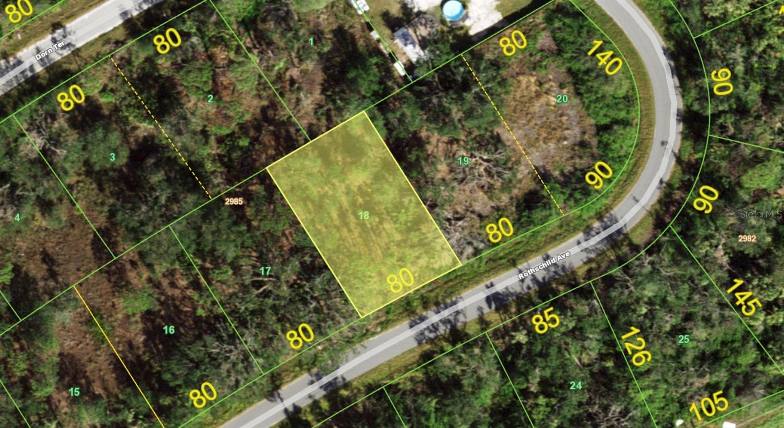 Discover the potential of this oversized wooded homesite located in a peaceful and natural setting along Rothschild Avenue in Port Charlotte. Tucked away among native Florida vegetation, towering pines, and mature oaks, this property offers the perfect backdrop for building your custom dream home while enjoying privacy and the beauty of Southwest Florida's natural landscape. Whether you're seeking a full-time residence, seasonal getaway, or investment opportunity, this parcel provides endless possibilities.

Ideally situated near the Port Charlotte and North Port border, the property offers convenient access to shopping, dining, medical facilities, schools, golf courses, parks, and everyday conveniences. Outdoor enthusiasts will appreciate the proximity to boating, fishing, kayaking, hiking trails, nature preserves, and the pristine Gulf beaches of Englewood, Boca Grande, and Manasota Key. The nearby Myakka River and Charlotte Harbor provide some of the area's best opportunities for waterfront recreation and world-class fishing.

Located just minutes from El Jobean Road (SR-776), commuting throughout Charlotte and Sarasota Counties is simple and convenient. The area continues to experience significant growth, making this an attractive option for buyers looking to secure land in a developing community before future expansion. With no HOA fees, no required time frame to build, and plenty of room to create your own private oasis, this property offers flexibility and long-term value.

Enjoy spectacular Florida sunsets, abundant wildlife, and a relaxed coastal lifestyle while remaining close to all the amenities Southwest Florida has to offer. Well and septic will be required. Don't miss this opportunity to own a piece of Florida paradise and build the home you've always envisioned.