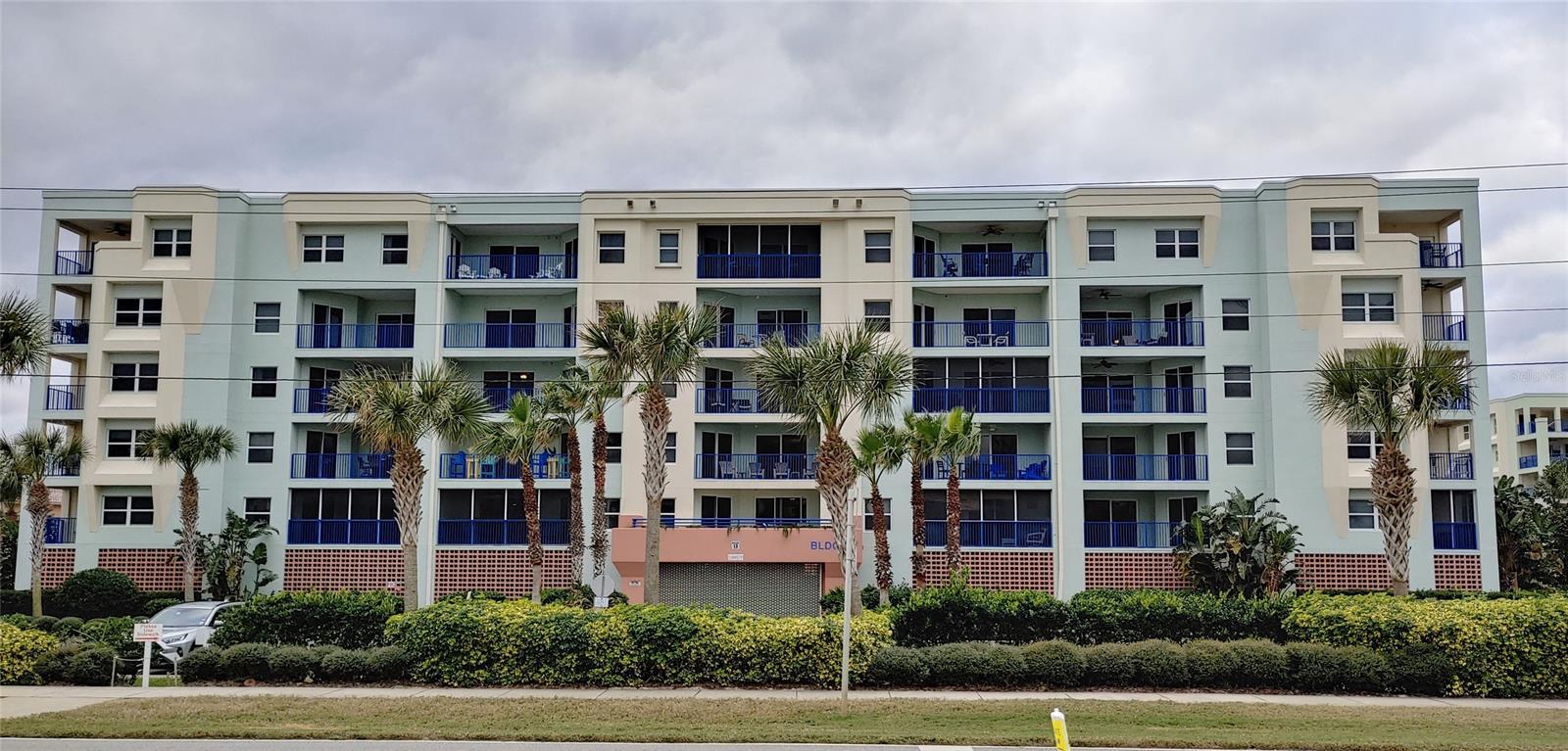 Feel the Ocean Breeze or watch the beautiful sunsets in this spacious never lived in 2 bedroom 2 bath condo. Enjoy resort living at its best in this gated community.  This unit is situated at the beach walkway and in front of one of the beautiful clubhouses and community pools.   Amenities galore with 2 clubs houses, 2 heated community pools, fitness center, 2 tennis courts, shuffleboard, and a 1 mile long wooden nature walking trail.   Gated Covered Parking for your vehicles and bicycles.  Across the street from the no drive beach.  Fully furnished this unit has only been stayed in a handful of time.  Enjoy entertaining in this Open Floor Plan that flows to a covered balcony where you can imagine watching the beautiful sunsets each evening.  An open kitchen with breakfast bar and pantry flow right into the living and dining area. A large Master suite with separate garden tub and shower, his and hers sinks and spacious walk in closet. In unit 6X8 laundry room. Bring your pet to enjoy the fun with you. This unit can be rented for extra income with a 3 day minimum rental. Elevator to each floor of building.  Just a short ride to shopping, dining, Flagler Avenue and Canal Street nightlife.  New Smyrna Beach has it all and is know for some of the best restaurants in Florida.  Centrally located at a little over an hour to Orlando Attractions and Cape Canaveral’s Rocket Launches.  About an hour from St Augustine and 30 minutes to Daytona Beach and Bike and Race Weeks.  From sunrise to sunset you will know you are home.  So why not let the FUN begin, because after all you are on Florida’s Fun Coast. Call today for an appointment to view this unit. ;Water: City