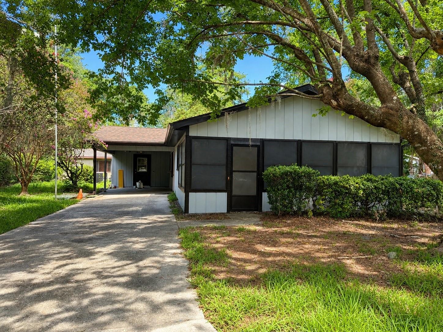 Move-in ready corner-lot single family home featuring a brand-new roof (2026) and new HVAC (2025)! Located in the highly desirable Turkey Creek Forest, one of Gainesville's most affordable active adult communities, this recently renovated home offers exceptional value with HOA dues under $50/month. Residents enjoy an impressive array of amenities, including a heated pool, clubhouse, tennis courts, shuffleboard, library, craft room, scenic walking trails, and a full calendar of social events and activities. Conveniently located near shopping, dining, medical facilities, and more, this is low-maintenance Florida living at its best!