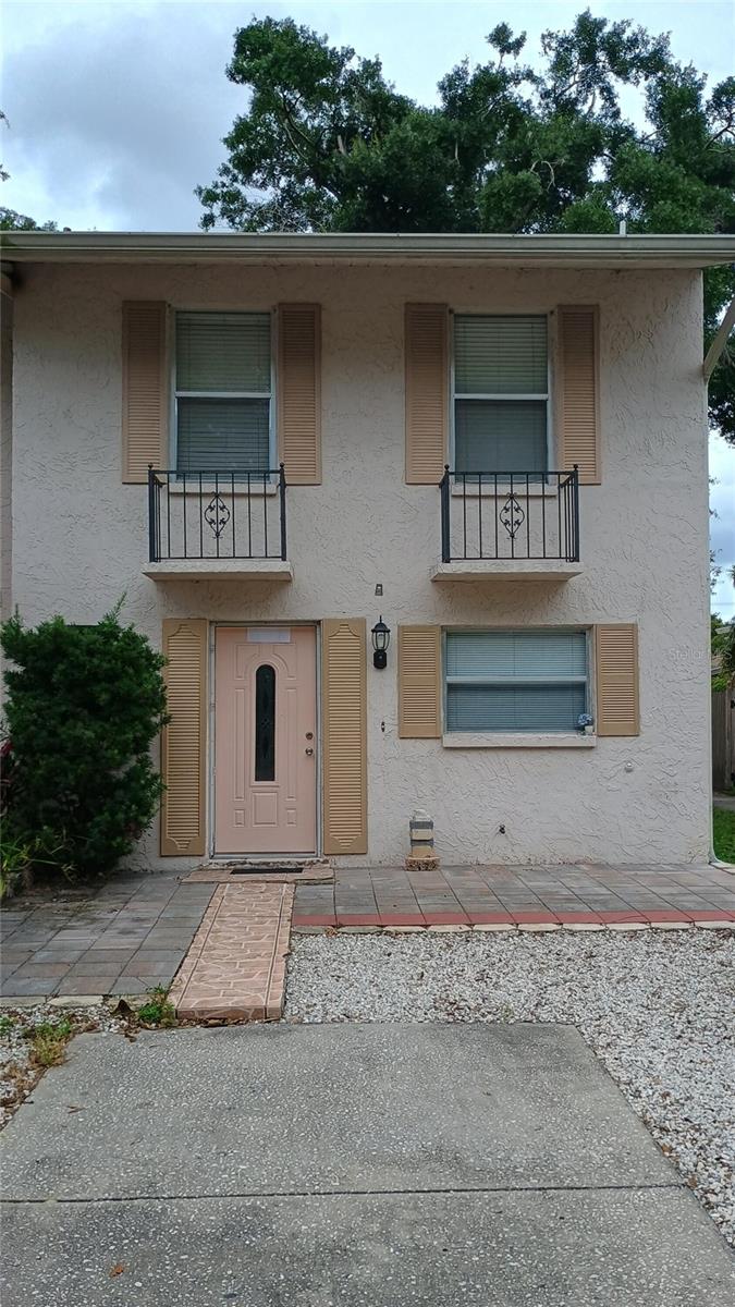 A spacious 3 bedroom 2 full bathroom end unit townhome located in Carrollwood in the quiet neighborhood of Carrollwood Pines with NO HOA or CDD! Located in FEMA zone X, a minimal risk flood area. A great option for a primary residence or high rental potential in a high-demand area. Easy access to Dale Mabry, I-275, Tampa International Airport, Raymond James Stadium, and Tampa Riverwalk. Local schools include Carrollwood K-8 Elemetary School, Adams Middle School, Chamberlain High School. Conveniently located near fine dining, numerous banks, health facilities, malls, entertainment, and shopping such as Whole Foods, Barnes & Noble, Sprouts, Publix, Walmart, Target, Sam's Club, Lowes, Home Depot, and others.  Additionally, close to beautiful Al Lopez Park and Carrollwood Village Park, both with nice large dog parks.  Exterior cement block construction and roofing separate from neighbor unit.  Ceramic tile throughout downstairs with carpeting upstairs and on stairway.  Spacious kitchen, dining area, living room, and full bathroom on the first level.  Large master bedroom, two spare bedrooms, and large full bathroom on the second level.  Attached storage shed with washer and dryer hookups and hot water heater.  Patios in from and rear of townhome.  Dedicated parking available for at least two vehicles.  Townhome needs some TLC and is being sold "as is", owner selling. No wholesaling. This townhome will not last very long!