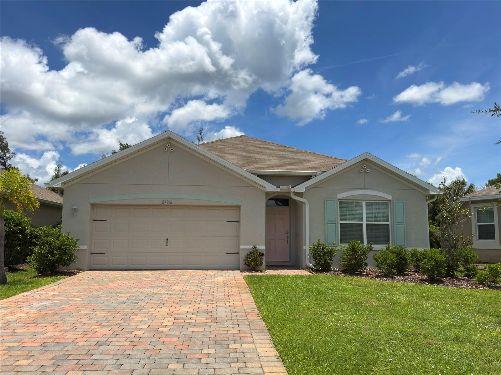 Welcome home! Step inside this one-owner 4-bedroom, 2-bathroom home located in the highly sought-after, gated Calusa Creek community in Punta Gorda. Built in 2019, this inviting 1,846 sq. ft. property showcases true pride of ownership, having been lovingly maintained by just one original owner since construction. The home features the popular Cali floor plan by D.R. Horton, offering an airy, open-concept design that is perfect for gathering with loved ones or entertaining friends. Inside, the freshly painted interiors welcome you right in. Several closets, walk-in pantry and the laundry room are accented by stylish, removable accent wallpaper that peels off easily without damaging the walls. The laundry room features a butcher block counter top, along with ceiling height cabinets featuring soft close hinges and *NEW* in 2024 black Samsung front loading washer and dryer. Upgraded light fixtures throughout the home such as the Alberto Small Single Tier Chandelier featuring six sculptural lotus like cups hand finished in a crisp white plaster in the dining room and two savoy house semi-flush mount in matte black and brass in the entry hall. The 18-inch tile floors throughout the common areas and all grout lines have been professionally cleaned and refreshed for a pristine, sparkling look. A bright and well-appointed kitchen serves as the heart of the home, featuring plenty of counter space, walk in pantry, large cabinets, and an open view into the main dining and living areas so you never miss a moment. When it is time to unwind, the primary suite serves as your private retreat, complete with a large walk-in closet, along with storage closet and a private water closet. Step outside into your own private oasis, featuring a secure, fully fenced backyard highlighted by a beautiful, mature oak tree that provides excellent shade. This beautiful homesite features a desirable northern exposure, offering a lovely screened in lanai featuring brick pavers and an outdoor space with plenty of room to add a private pool down the road. Built with durable, low-maintenance block and stucco construction, the home comes fully equipped with handy hurricane shutters, an ADT security system, sliding doors to the patio, an attached 2-car garage, and a built-in lawn irrigation system. With a secure gated entrance, a sparkling community pool perfect for sunny Florida days and beautiful community lakes ready for catch-and-release bass fishing, you get to enjoy all of these fantastic neighborhood amenities with low HOA fees and absolutely no CDD! This property offers quick, easy access to I-75 to make commuting a breeze, and sits just minutes away from fantastic local shopping, delicious dining, and the lively waterfront amenities of downtown Punta Gorda.