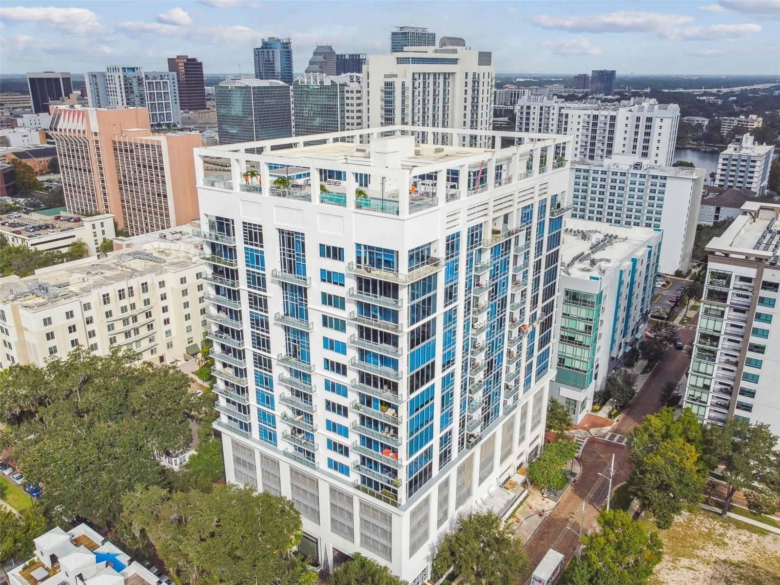 Luxury living on the 10th floor of Star Tower!  This immaculate unit includes floor-to-ceiling windows, top of the line appliances (including Wolf oven, Miele dishwasher, and Sub-Zero refrigerator), custom-built closets, a whole house water filtration system and water conditioner, and a Murphy Bed system in the second bedroom.  Enjoy the rooftop pool, spa, fitness center, resident lounge, 24 hour concierge, and grilling area. Walking distance from Lake Eola, the Dr. Phillips Center, the Amway Center, Publix, and everything else that Downtown Orlando has to offer!  This unit comes with 2 spots for bikes in the bike cage, a storage unit, and two parking spaces in the garage.