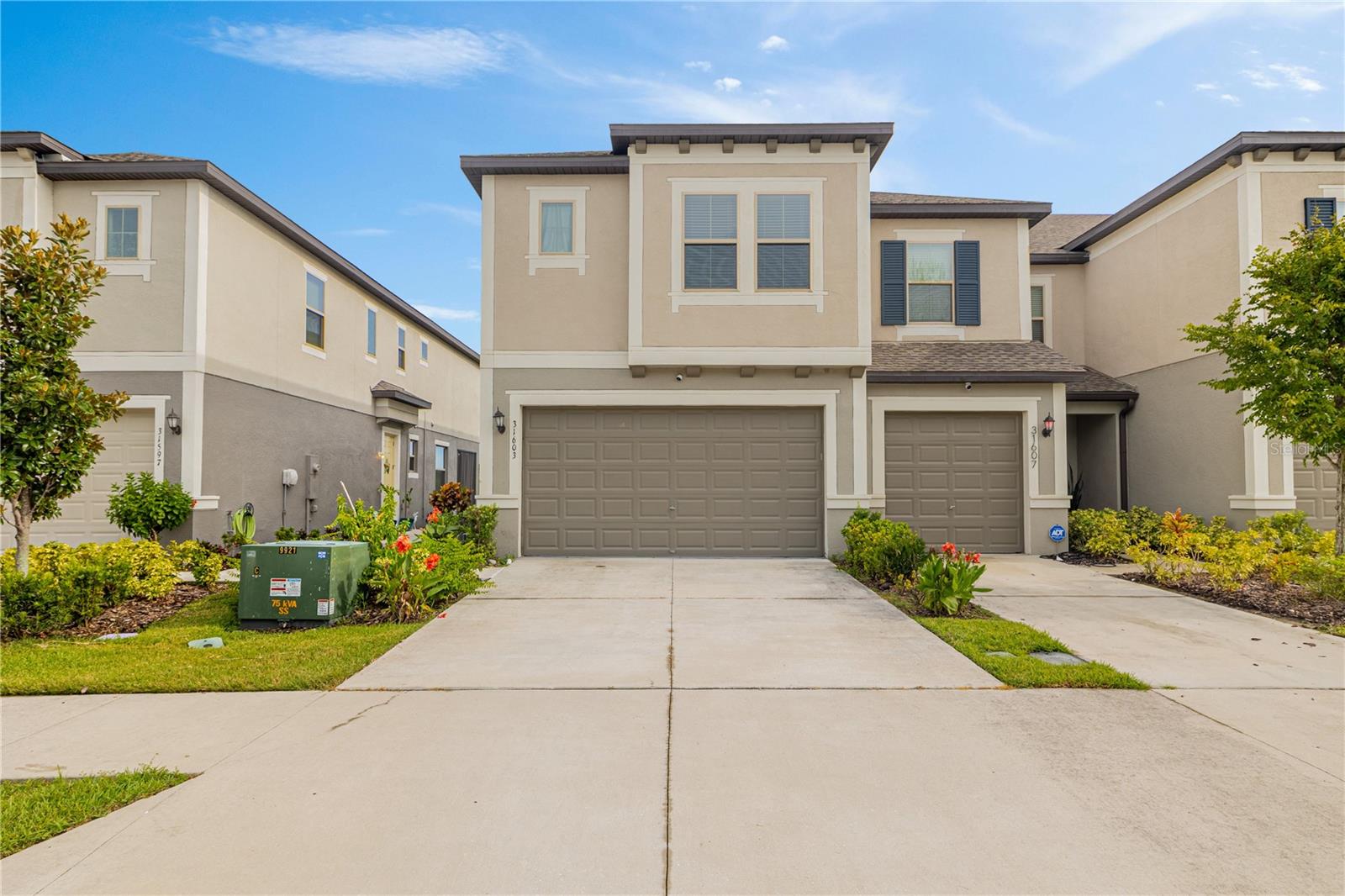 Your chance to live in the Crystal Lagoon Community is Here! Beautiful 3 bedroom, 2.5 bathroom, 2 car garage + loft. First floor features an open concept where the family can all gather for dinners and entertainment. Second floor you will find 3 bedrooms 2 full bathrooms and a loft. Master bedroom feature dual sinks, glass enclosed shower and a walk in closet. This unit is located on a corner lot for more privacy. Features a view of the Conservation, and you can watch the SUNSET from the Screened in patio and Family Room. The Crystal Lagoon is known for the tidal pools, cabanas, swim up bar restaurants, family beach , event pavilion and so much more. Come and enjoy living in one of the most sought out communities in the Wesley Chapel area. house upgrades Includes : 1. Colligan Water Softener 2. RO 3. Epoxy flooring in garage and patio 4. Overhead storage in garage 5. Accent walls School Zone: Kirkland high school , Kirkland k-8 , In prep elementary and middle school.