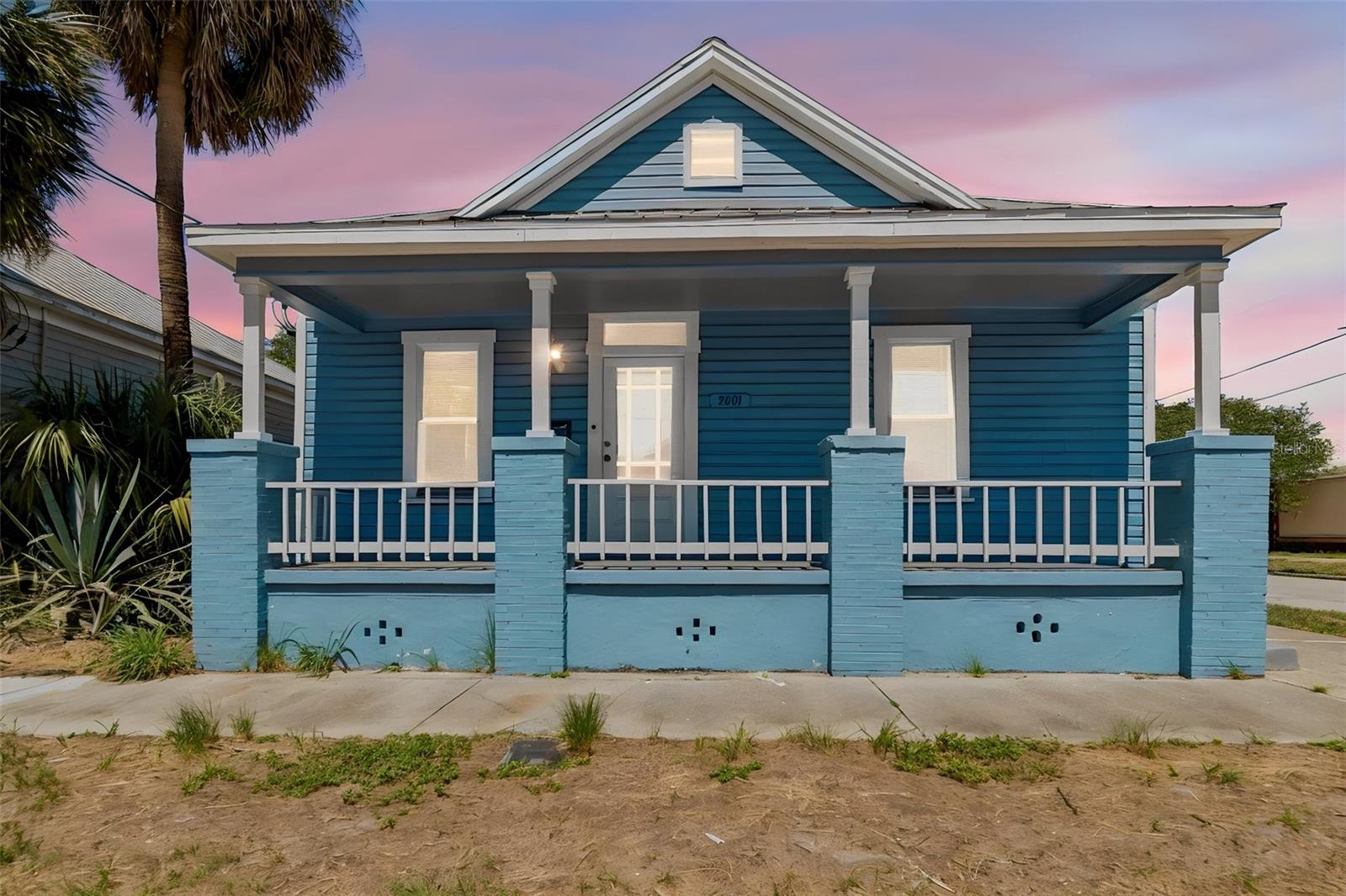 Welcome to this charming, move-in ready bungalow ideally located just minutes from Historic Ybor City and Downtown Tampa. This home features an open living and dining area with high ceilings, abundant natural light, updated flooring throughout, and two full bathrooms.

The kitchen offers plenty of cabinet and counter space along with black appliances, while both bathrooms have been updated with modern finishes. Enjoy relaxing on the spacious covered front porch, perfect for morning coffee or unwinding in the evening.

Conveniently located near Ybor City, Downtown Tampa, Channelside, Water Street, Armature Works, shopping, dining, major highways, and everything Tampa has to offer. Whether you're looking for a primary residence or an investment property, this home is ready for its next owner.