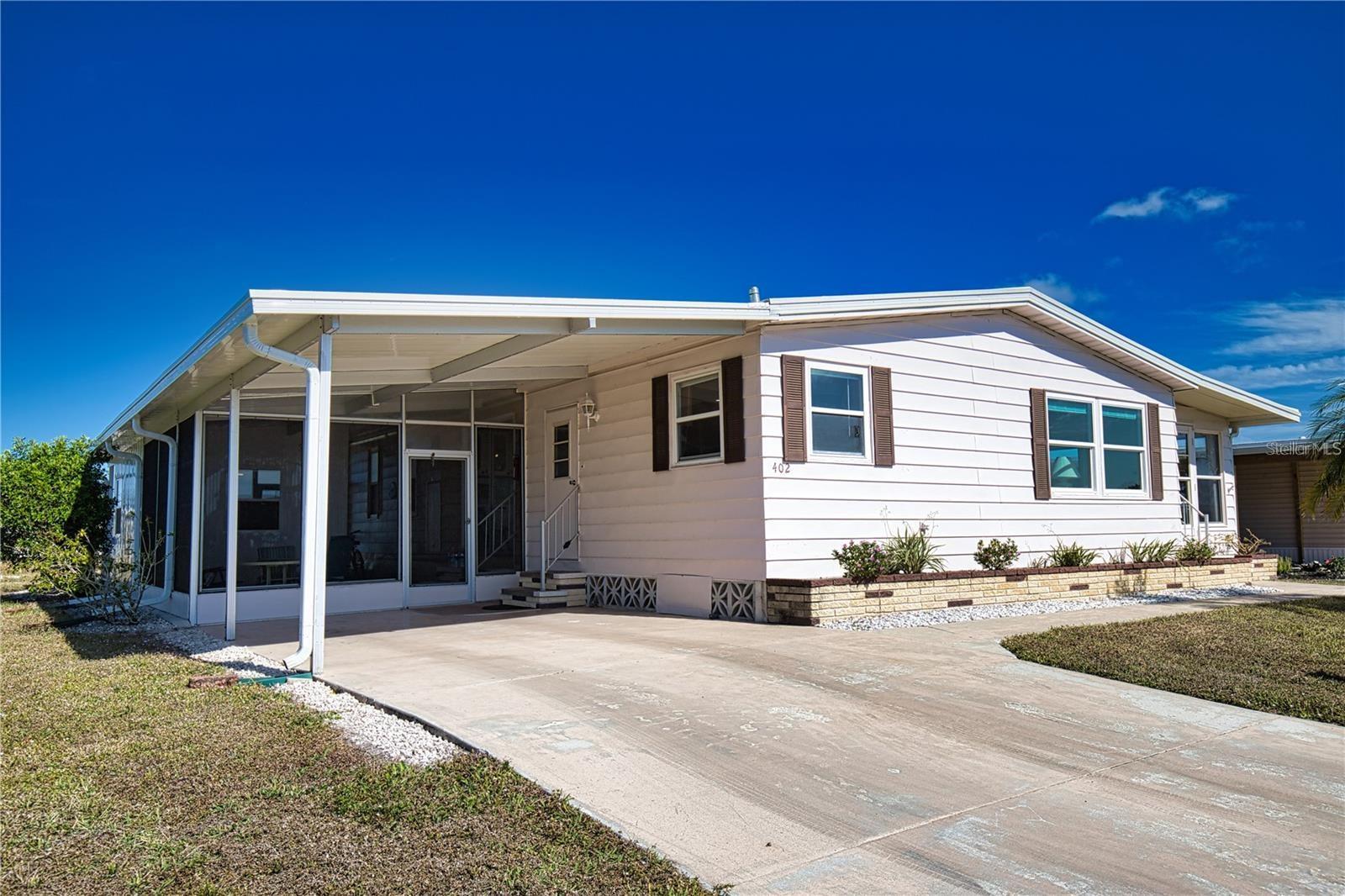 Don’t miss is your chance to enjoy the Florida dream in a vibrant 55+ community! This lovely La Casa  home features an open concept kitchen/dining/living room area that is perfect for entertaining guests. The living room opens to an oversized Florida Room with windows on 3 walls for lots of natural light. The primary bedroom is extremely spacious with an private bathroom that offers a generous walk-in closet and a walk-in shower. Secondary bedroom features 2 wall closets with great size guest bath right across the hall. New Shed 2024. Membrane Roof 2024. New Vapor Barrier 2024. A/C 2022. 
La Casa boasts 974 homes nestled among a variety of native trees with spacious common grounds surrounding our eight lakes.  The ultimate lifestyle on Florida's Gulf Coast is located between Sarasota and Fort Myers and is a boater's dream with access to the Gulf of Mexico. It is convenient for shopping, sightseeing, golfing, fishing, and boating, as well as all the culture and elegance the Southwest Florida area is noted for. Residents and visitors enjoy the warmth of Southwest Florida winters in a relaxed and unhurried environment far removed from the hustle of Florida's east coast. You'll be surrounded by mature lush landscaping which demonstrates the utmost level of care our property receives from residents and management. La Casa may have the best pools in the area with an extremely large, 40 X 60-foot swimming pool that is kept at a perfect 87 degrees and second 20 x 40 pool quietly nestled between the clubhouse and the Activity Building. Both pools have adjacent hot tubs. Free Wi-Fi is available for your convenience at the Clubhouse, Activity Building, Recreation Hall area and  pools & spas.
