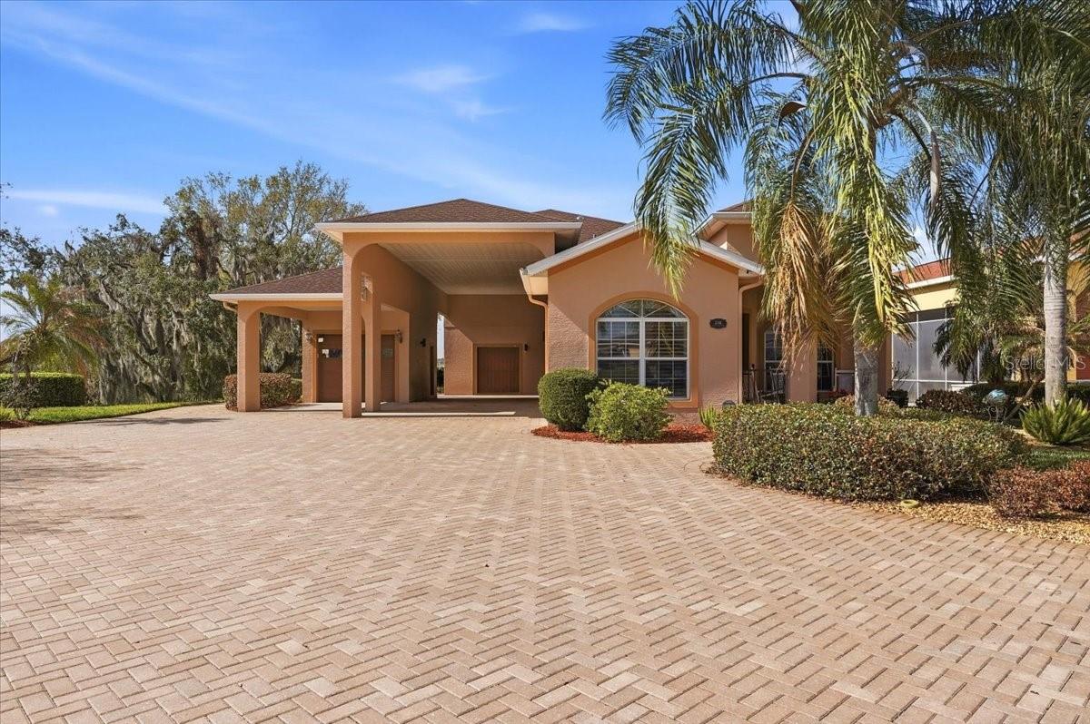 Lakeside Luxury Meets the Ultimate RV Lifestyle
Experience the pinnacle of Florida living in this stunning, 2-bedroom, 2-bathroom home plus a versatile flex room/office in block-construction. Perfectly situated with a serene lake view, this property is a masterclass in quality and custom detail.
The Ultimate RV Setup
This home features a massive, integrated RV Port measuring approximately 55’x16’, allowing you to keep your rig protected and ready for the next adventure right at your doorstep.
Exquisite Interior Details
Step inside to find a home that feels like a model.
• Custom Finishes: Professional custom painting throughout creates a cohesive, high-end atmosphere.
• Chef’s Kitchen: Outfitted with gleaming granite countertops and premium finishes.
• Light & Comfort: Elegant plantation shutters frame high-quality insulated windows, offering both energy efficiency and timeless style.
• Convenience: Includes a central vacuum system and a water softener for effortless maintenance.
Outdoor Oasis & Mechanical Peace of Mind
• New Roof: Move in with total confidence. Replaced in 2023
• Lakeside Entertaining: Enjoy the view from your patio, complete with piped propane for your outdoor grill and fire pit—perfect for sunset gatherings.
• Lush Landscape: Keep the curb appeal high without the high water bill thanks to a private well for irrigation.
This home is packed with "many upgrades" that must be seen in person to be fully appreciated. Whether you're working from the sun-drenched office or prepping for your next road trip, this lakeside gem offers a lifestyle of unparalleled comfort and convenience.