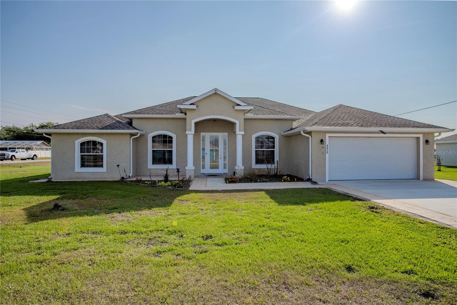 Seller motivated and open to reasonable offers. Don’t miss this opportunity, schedule your private showing today!
Welcome to 4820 Mackerel Drive, an inviting 3-bedroom, 2.5-bath home featuring stylish tile plank flooring throughout. The open layout offers a generous living area, formal dining space, and a dedicated home office.  The kitchen is designed for both everyday living and entertaining, with wood cabinetry, stainless steel appliances, granite countertops, a walk-in pantry, and a breakfast nook. French doors open to a screened patio with an outdoor kitchen—perfect for hosting.  The owner’s suite features a spa-inspired bath with dual vanities, a jetted tub, a walk-in shower with a rain head, and a large walk-in closet. Additional bedrooms are well-sized, and the home includes a half bath and a spacious laundry room with built-in cabinetry.  Built in 2022, the home offers a newer roof, AC, and water heater, all well maintained for added peace of mind. Ideally located in The Crossings of Sebring Ridge, just minutes from US Hwy 27 N, AdventHealth, shopping, and schools.  The shed does not convey and will be sold separately. The current refrigerator does not convey and will be replaced with a new unit, which may be different.