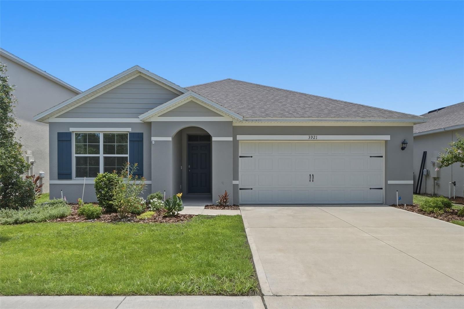 Welcome to this beautifully maintained 2024 home in the desirable Edgemont community of Clermont! Nestled on a quiet cul-de-sac, this move-in ready 3-bedroom, 2-bath residence offers a thoughtfully designed living space with an open-concept floor plan that's perfect for everyday living and entertaining.

The spacious kitchen flows seamlessly into the dining and living areas, creating the ideal gathering space for family and friends. The private owner's suite features a walk-in closet and an ensuite bathroom, while two additional bedrooms provide flexibility for guests, a home office, or growing families.

This home has been thoughtfully enhanced with upgrades you'll appreciate, including custom-built garage cabinetry that provides exceptional storage and organization. Step outside to the extended screened-in lanai featuring beautiful pavers - an ideal space to enjoy your morning coffee, entertain guests or unwind while taking in the peaceful water view. The private backyard offers a serene setting, while the absence of front neighbors provides an added sense of privacy and open views.

Built with modern finishes and energy-efficient construction, this home offers the peace of mind that comes with newer construction. Conveniently located just minutes from shopping, dining, schools, major highways and Central Florida's world-famous attractions, this home offers the perfect balance of comfort, convenience, and lifestyle.

Whether you're looking for a primary residence, vacation home, or investment opportunity, this exceptional cul-de-sac home checks all the boxes. Schedule your private showing today!
