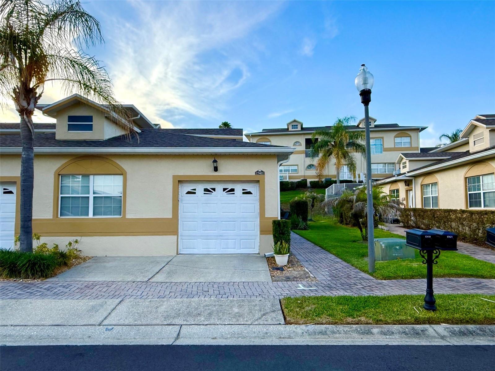 Welcome to this beautifully renovated 3-bedroom, 2-bathroom single-story townhome located in the highly desirable 24-hour guard-gated community of Magnolia Pointe. This move-in-ready home offers a perfect combination of comfort, modern updates, privacy, and convenience.
Featuring a bright and spacious open-concept floor plan, this home seamlessly connects the family room, dining area, and kitchen — creating an inviting space for everyday living and entertaining. The beautifully renovated kitchen features updated light cabinetry, granite countertops, and stainless-steel appliances, offering a modern and functional space perfect for cooking, entertaining, and everyday living.
The entire home has been thoughtfully updated with beautiful vinyl flooring throughout all rooms, offering a modern look, durability, and easy maintenance. The home also features double-pane windows throughout, helping improve energy efficiency, maintain comfortable indoor temperatures, and potentially reduce utility costs. This home offers an excellent location with easy access to shopping, dining, and entertainment, approximately 2 minutes from Costco, 20 minutes from Clermont Downtown, winter Garden Downtown, and Winter Garden Village. Convenient access to grocery stores, shopping centers, major roads, and highly rated Clermont schools. Less than 2 miles from Florida’s Turnpike, providing an easy commute to Orlando, downtown Orlando, and the theme parks. Don’t miss the opportunity to live in a beautifully updated home in one of Clermont’s most desirable communities. Call us now and schedule your private tour today!